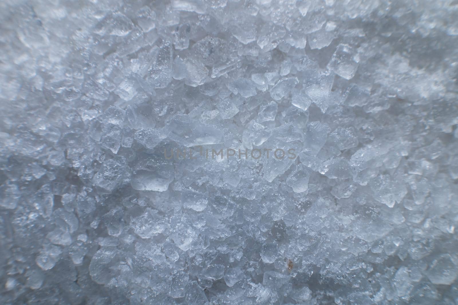 Coarse white iodized salt. Detailed background texture Macro close-up. Salt crystals of different sizes by yanik88