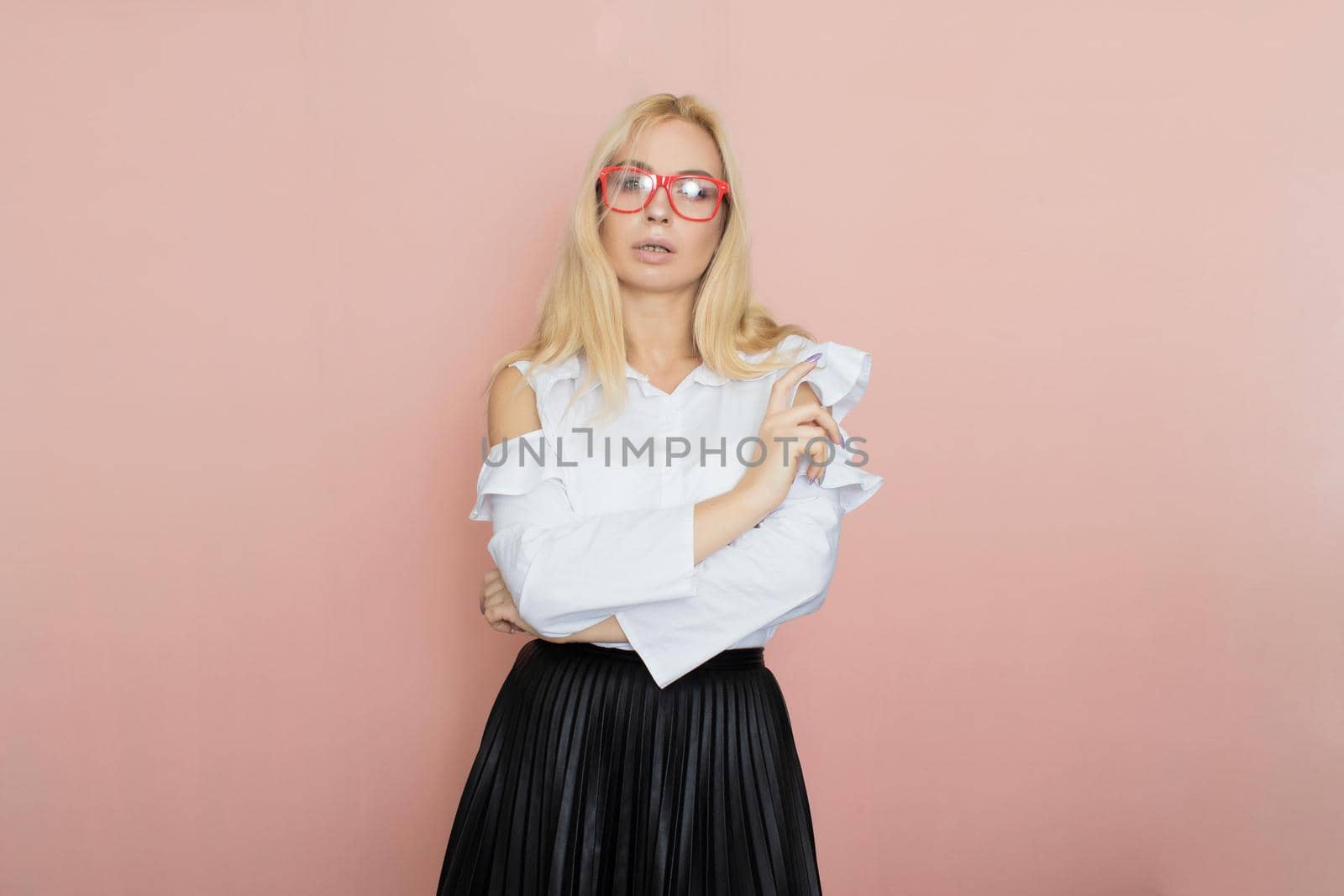 Woman in white blouse wearing red glasses by Bonda