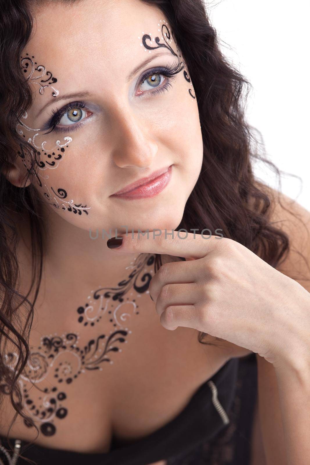 Beauty woman face with paint close-up portrait