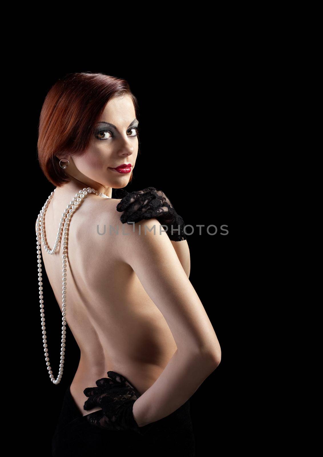 nude woman sexy portrait with pearl beads and gloves in retro style makeup