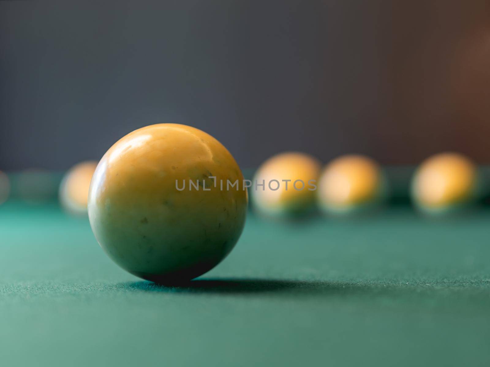 Close up photo of billiard balls on green pool table. by aksenovko