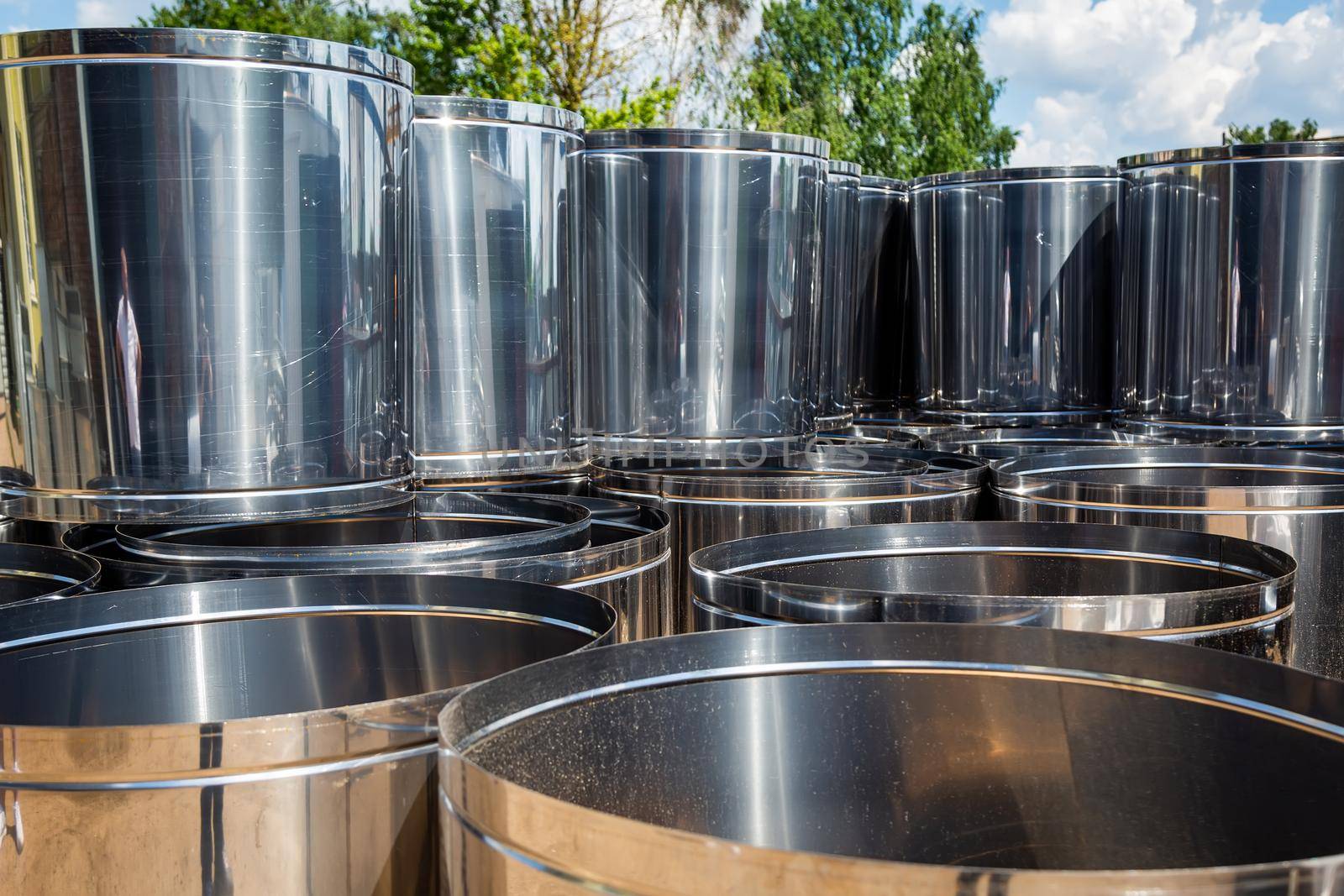 Ventilation pipe warehouse. Steel pipes, parts for the construction of air ducts for an industrial air conditioning system in a warehouse. Industrial airway ventilation equipment and piping systems.