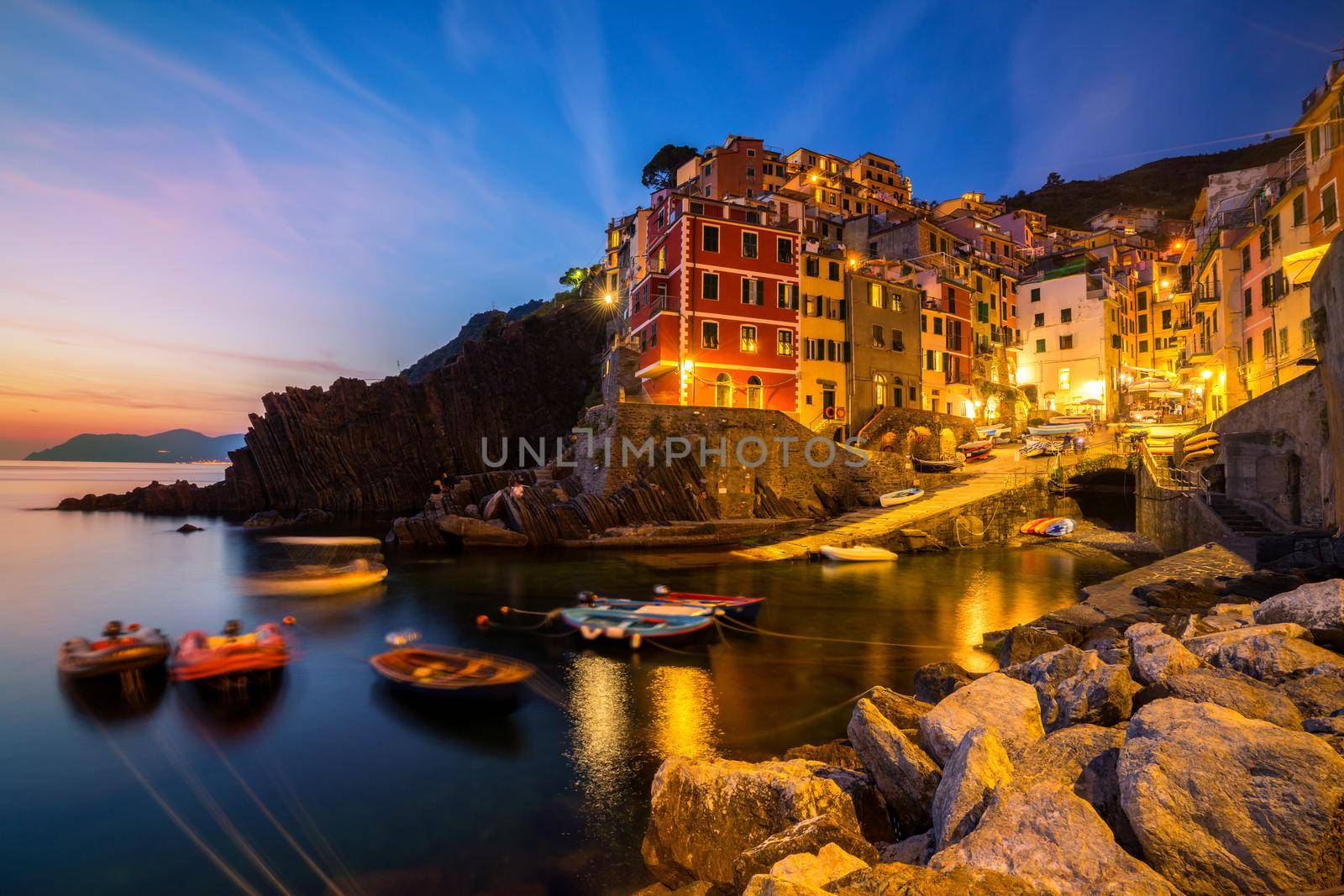 Riomaggiore of Cinque Terre, Italy - Traditional fishing village in La Spezia, situate in coastline of Liguria of Italy. Riomaggiore is one of the five Cinque Terre travel attractions.