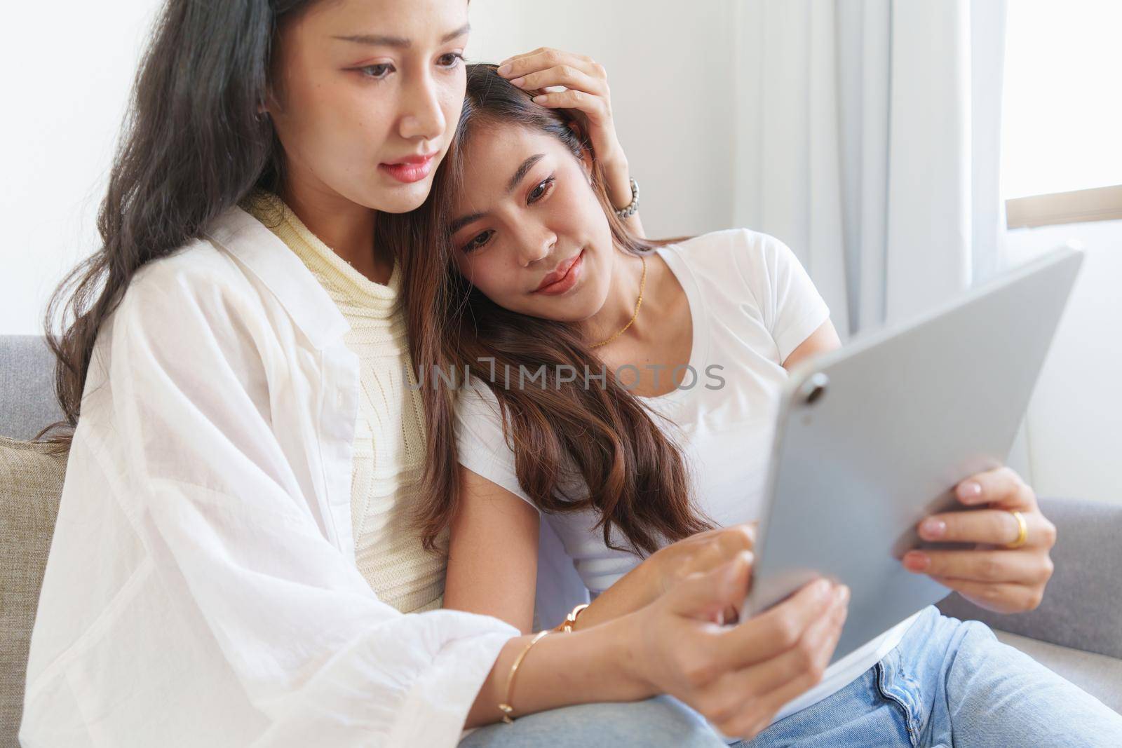 Young Asian Women LGBT lesbian couple love moments happiness at bedroom. LGBTQ or Gay and pride concpet