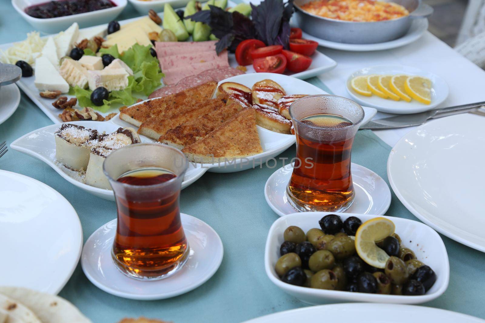 Organic, fresh traditional turkish village breakfast on wooden table by Djafarov