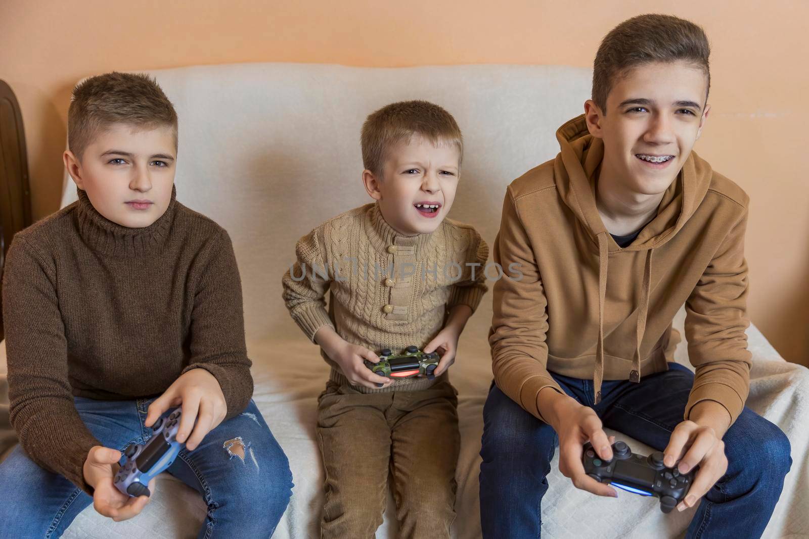 children playing console with joysticks