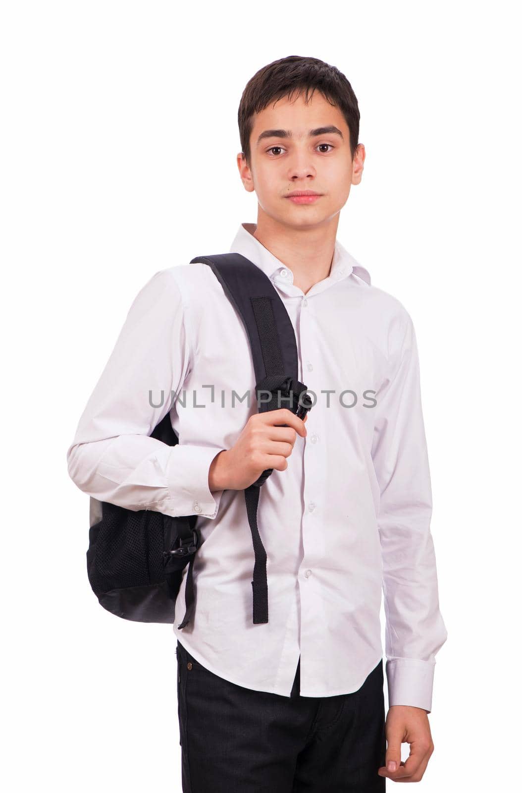 schoolboy in white shirt with backpack isolated on white background.