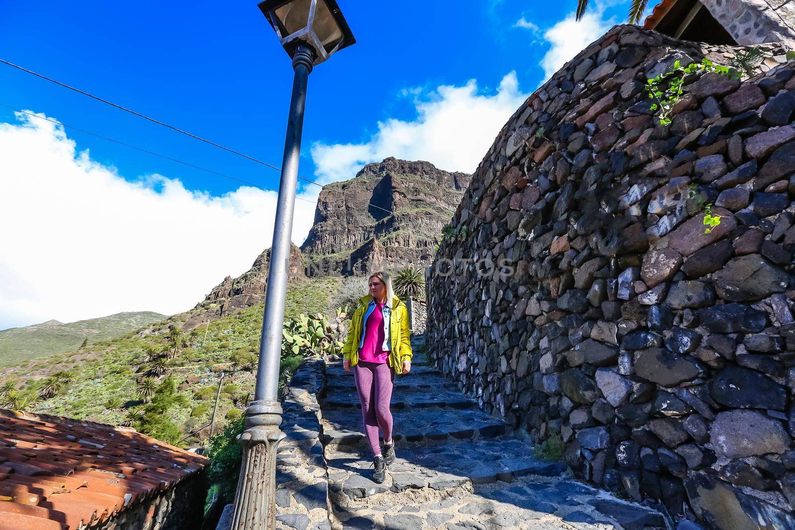 woman on Mountain village Masca on Tenerife, Spain. Tenerife landmark landscape by Andelov13