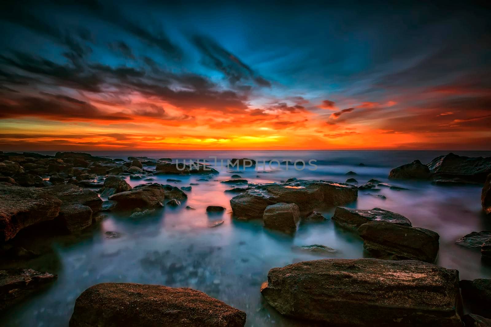 Magnificent sunrise view at the Black sea coast near Varna, Bulgaria. Blue hour