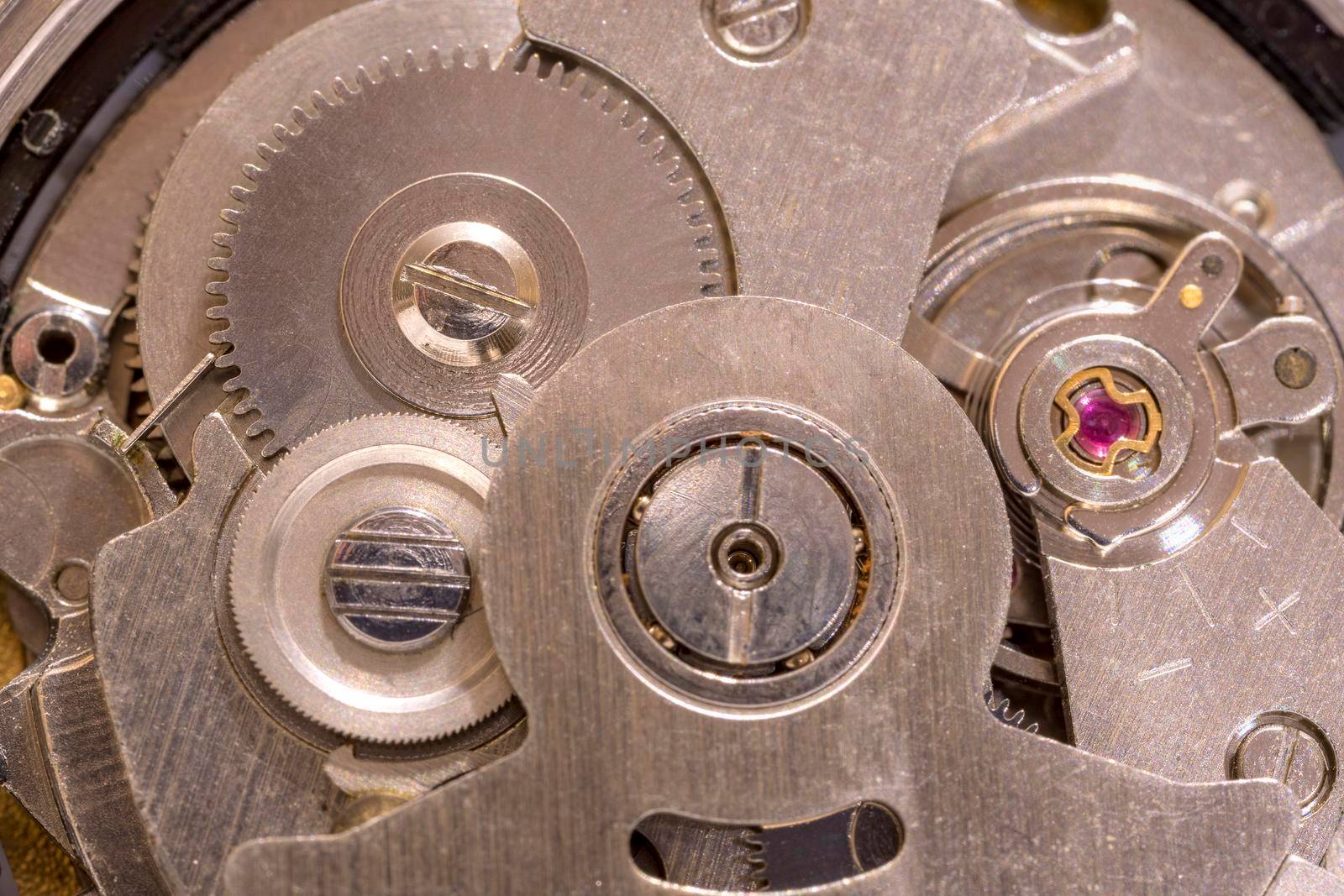 Macro shot of clockwork gears inside the old watch