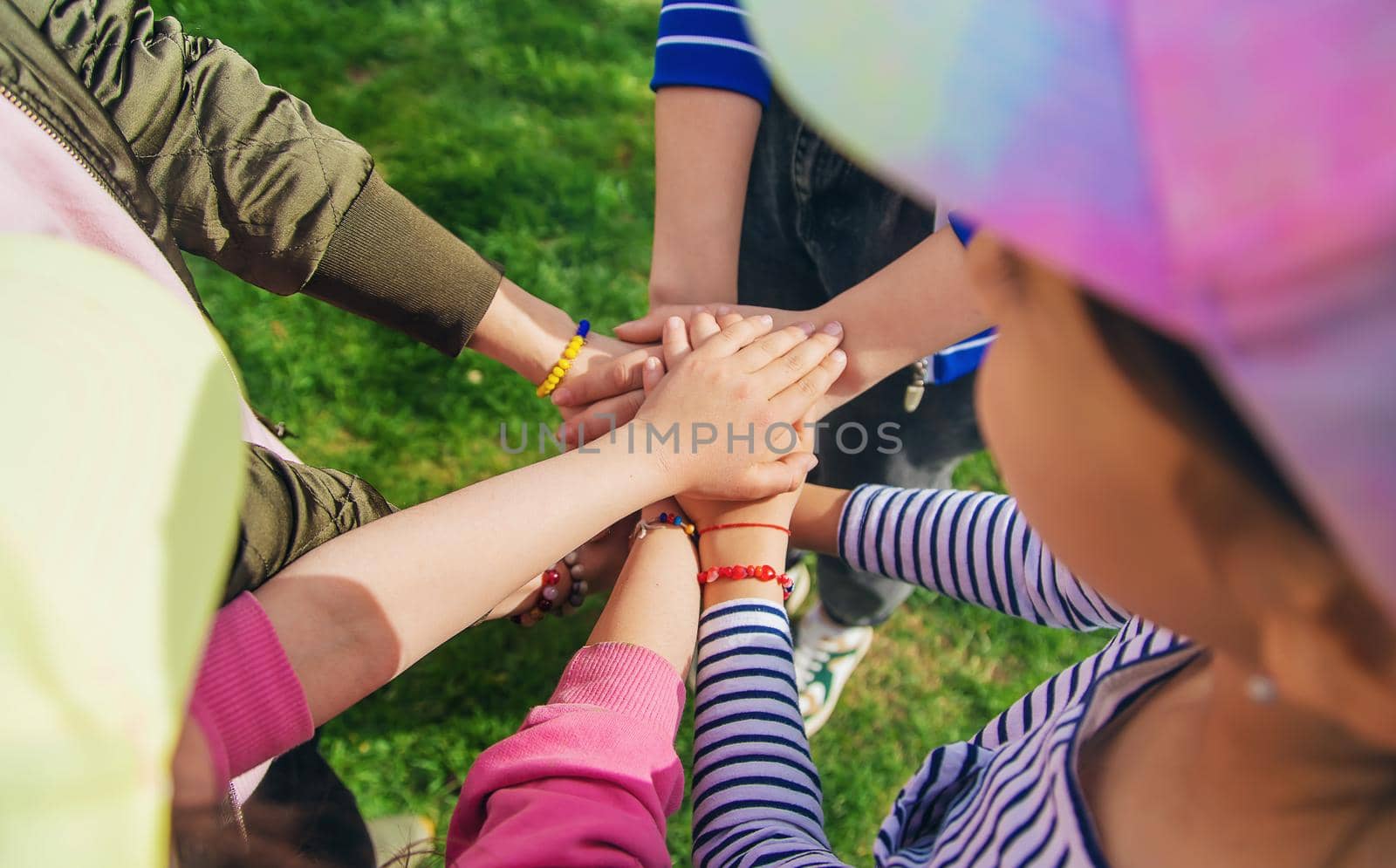 People put their hands together. Selective focus. Couple.