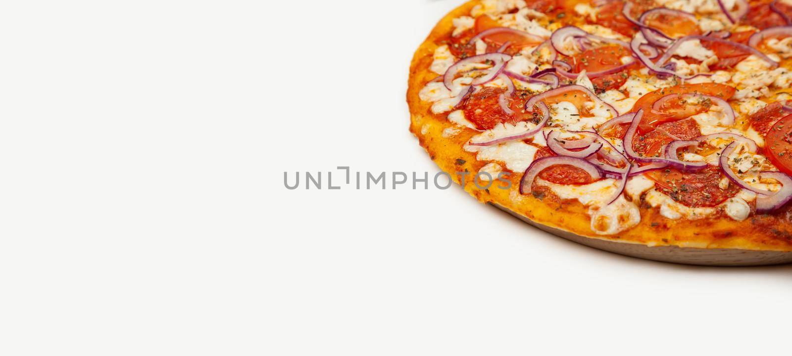 Delicious Rustic pizza. Signature sauce, mozzarella cheese, pepperoni, chicken fillet, tomatoes, red onion. Close-up. Advertising flyer and poster for restaurants. With copy space for text