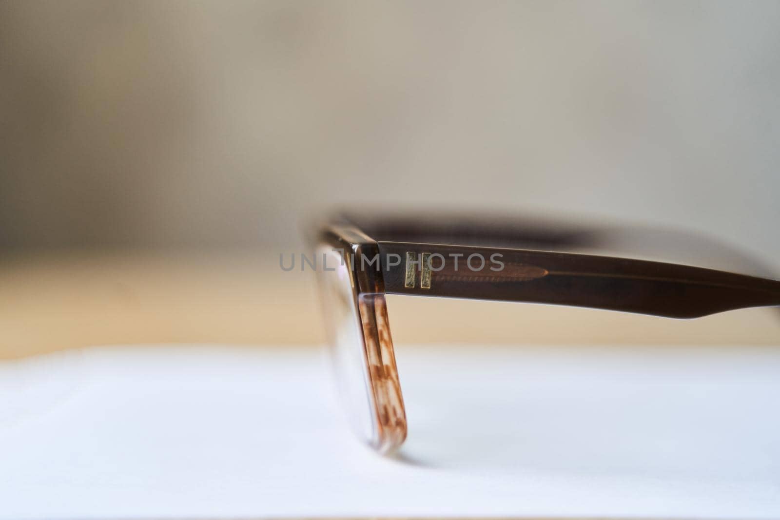 Fashionable brown eyeglass frame. Glasses for myopia. Close-up