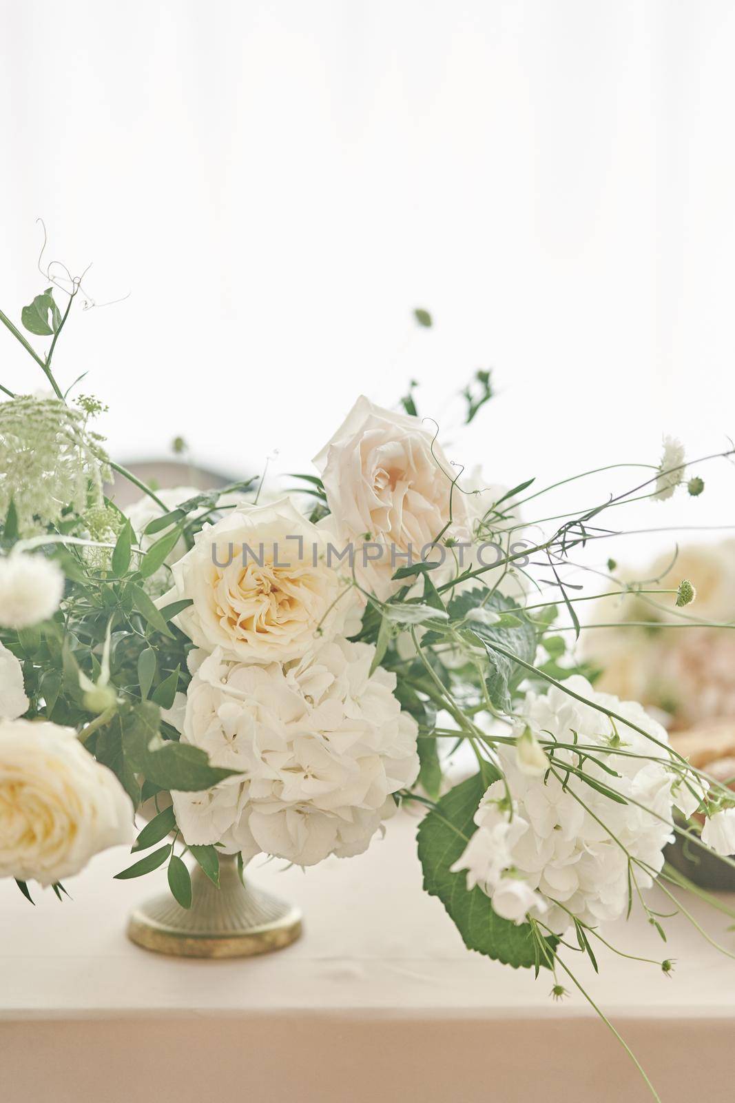 Wedding decorations. Flowers in a vase. Decoration of a wedding celebration. Close-up