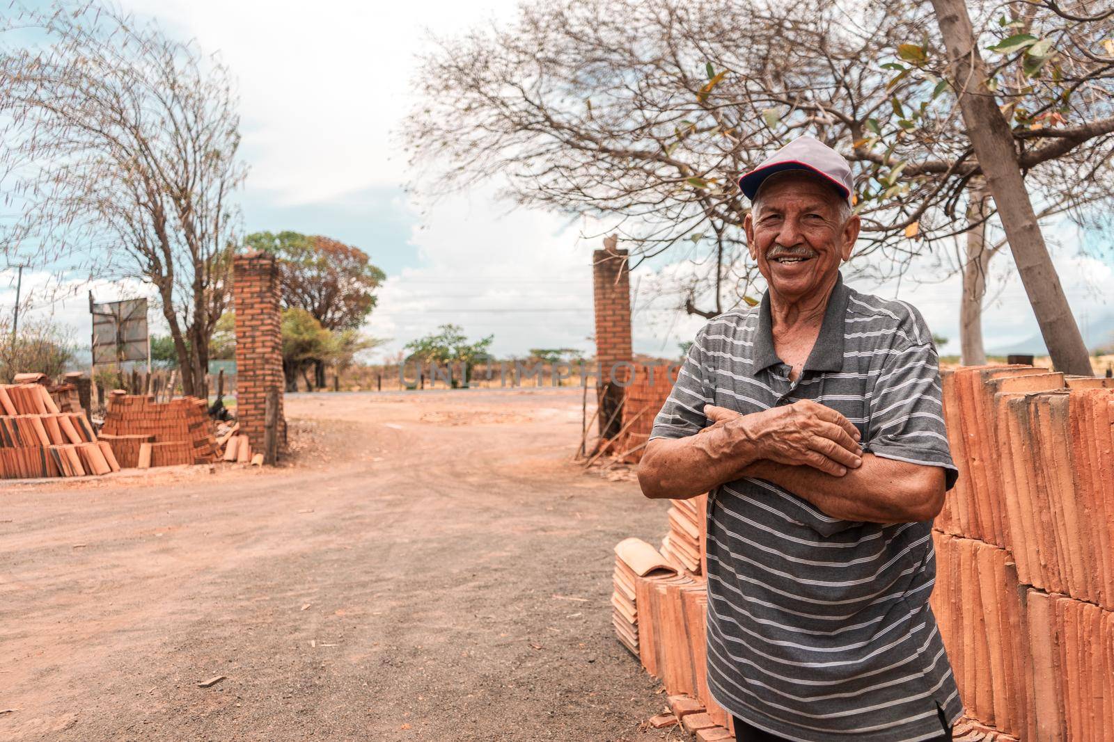 Owner of a traditional brick and clay tile manufacturing business in La Paz Centro. Concept of craft businesses in Nicaragua, Central America by cfalvarez