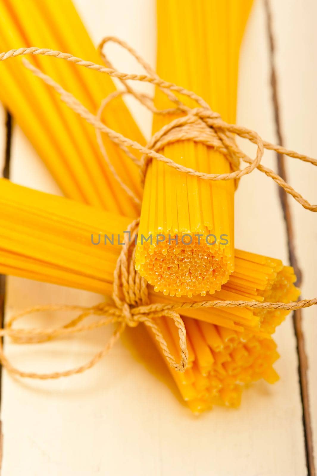 bunch of Italian pasta type on a white rustic table 