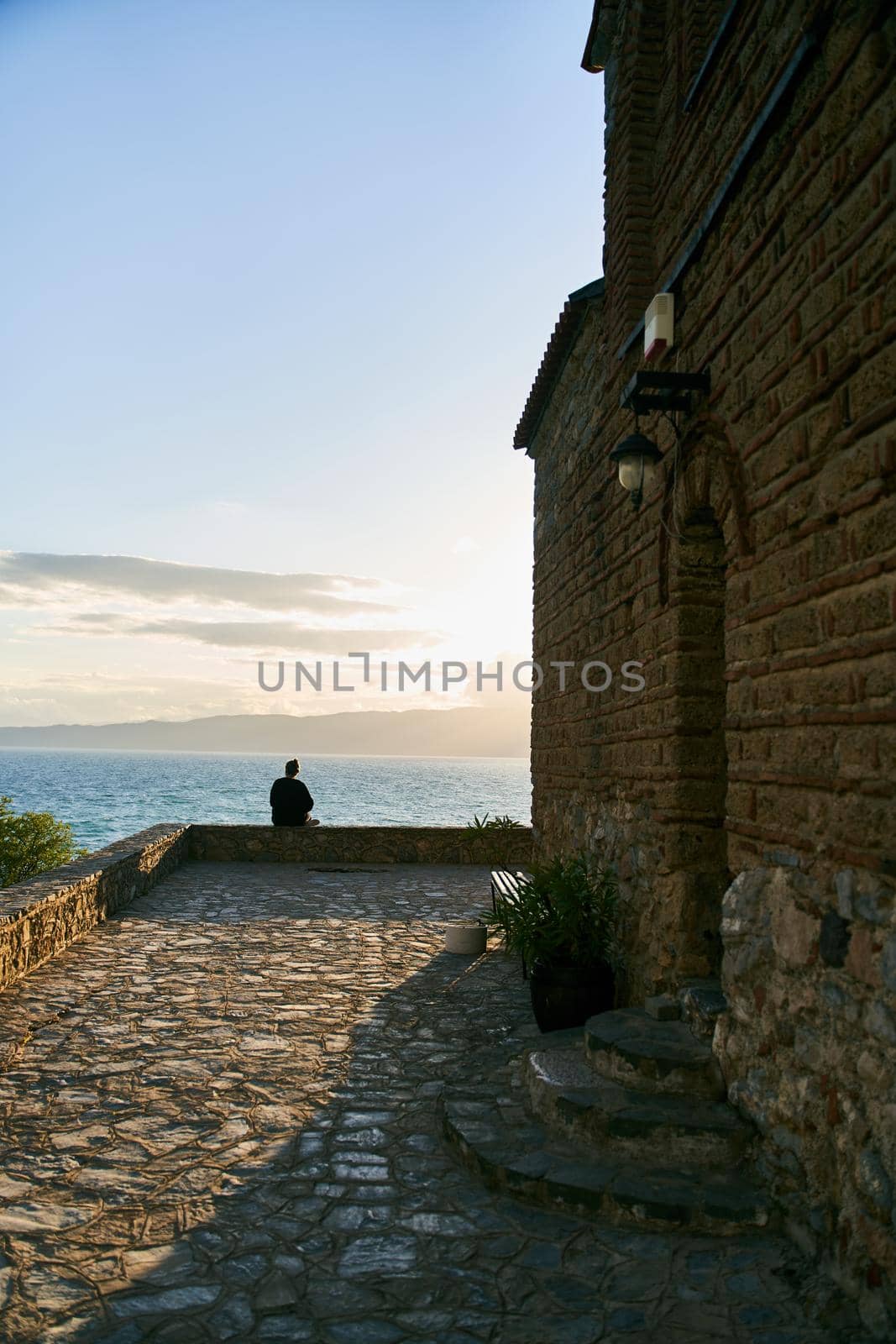 Church of St. John the Theologian at Kaneo, panoramic view at sunset, Ohrid, North Macedonia. High quality photo