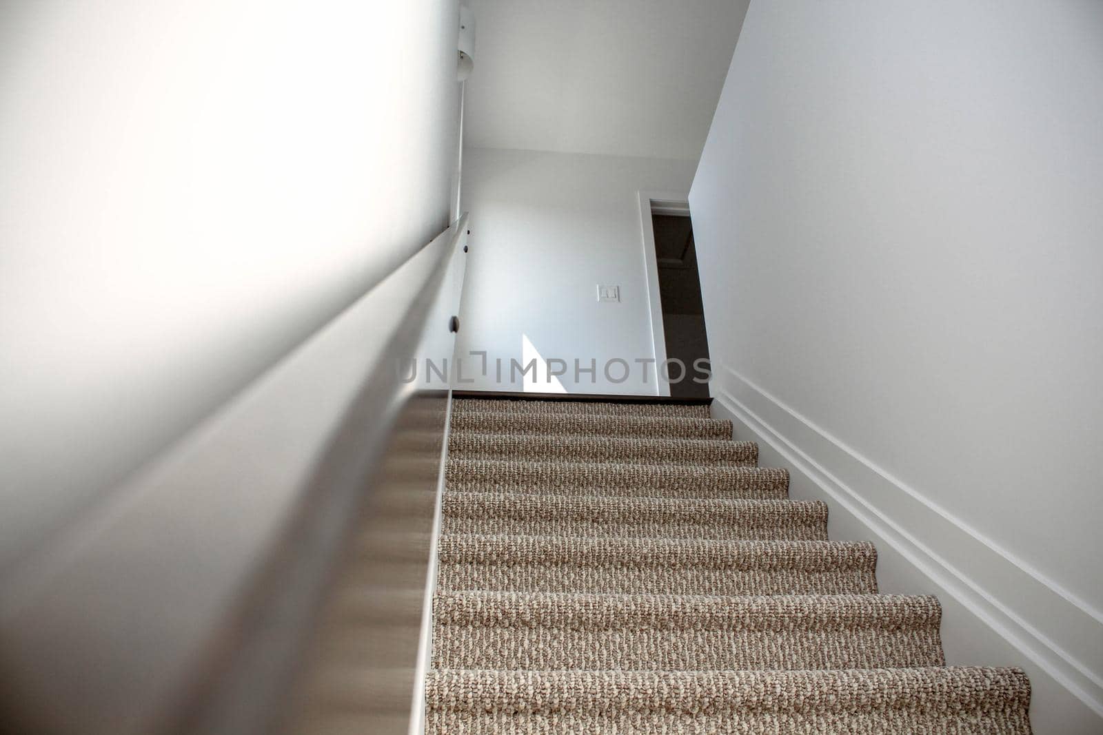 Top view of Staircase in the modern house with brown carpet, walk through ground floor by JuliaDorian