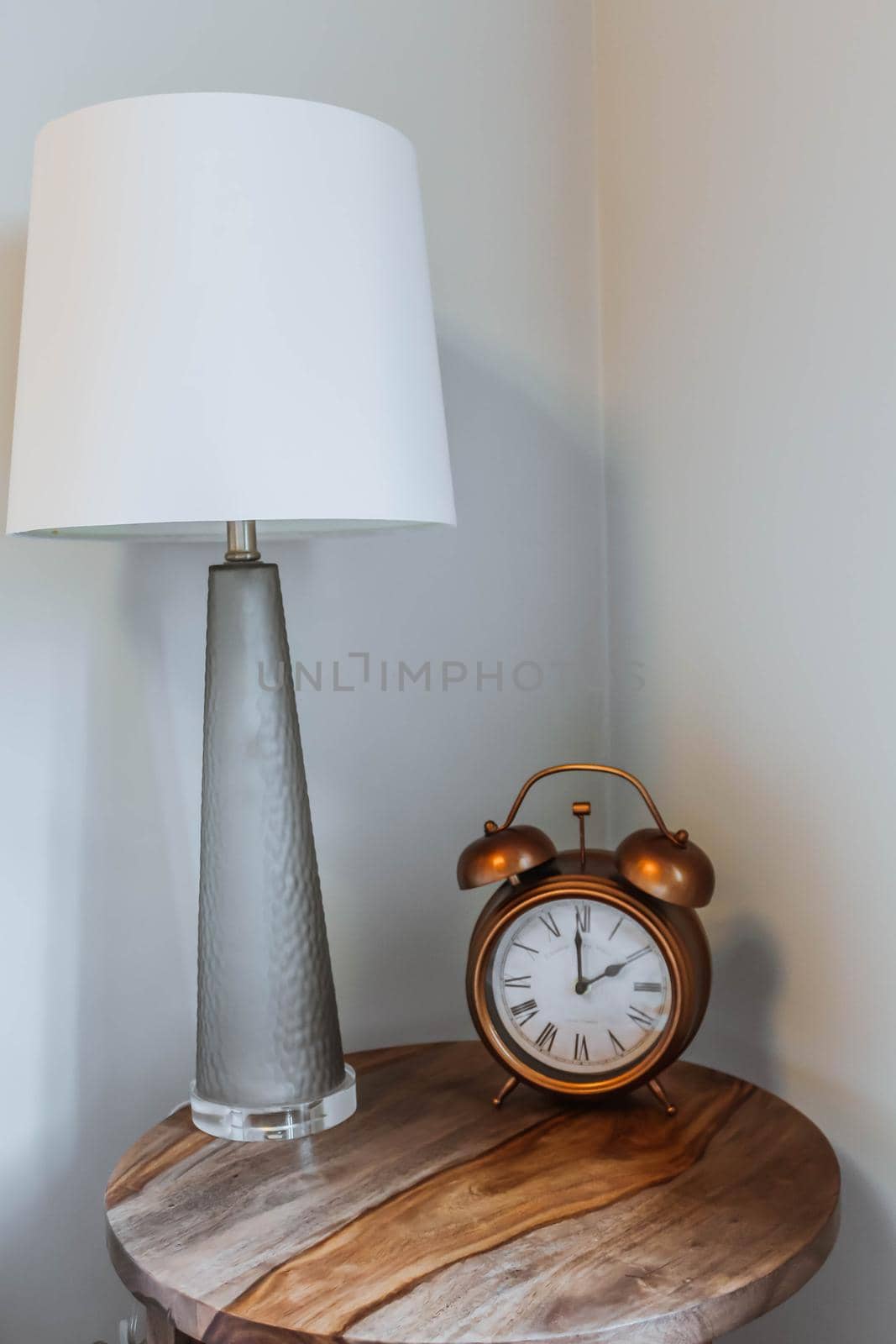 Alarm Clock and Reading Lamp on Bedside Table. Copy Past text by JuliaDorian