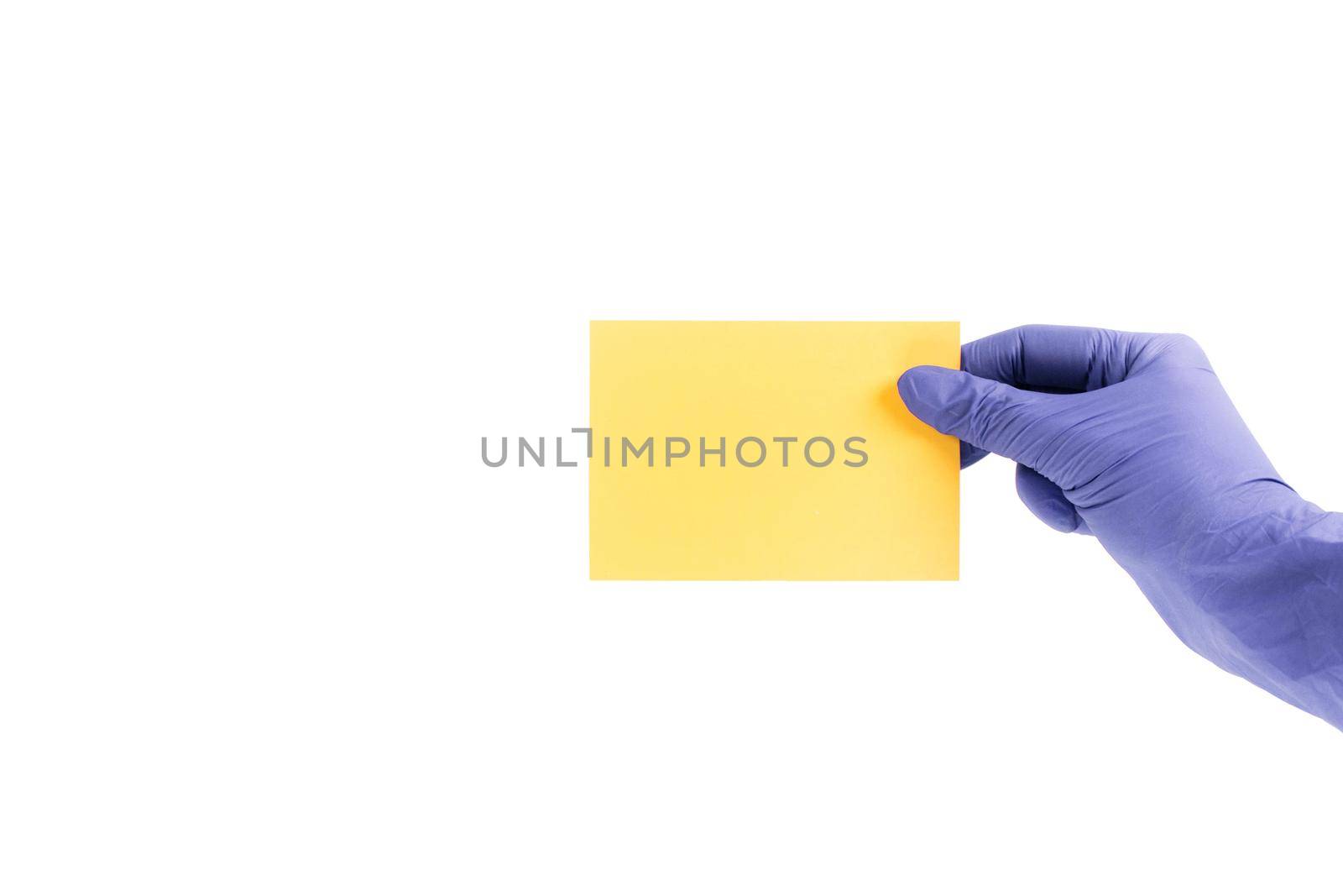 Women's hands i medical gloves hold swatches of the trendy color - illuminating yellow. Selection of year 2021 colors for design of clothes, interiors, websites and publications. by JuliaDorian