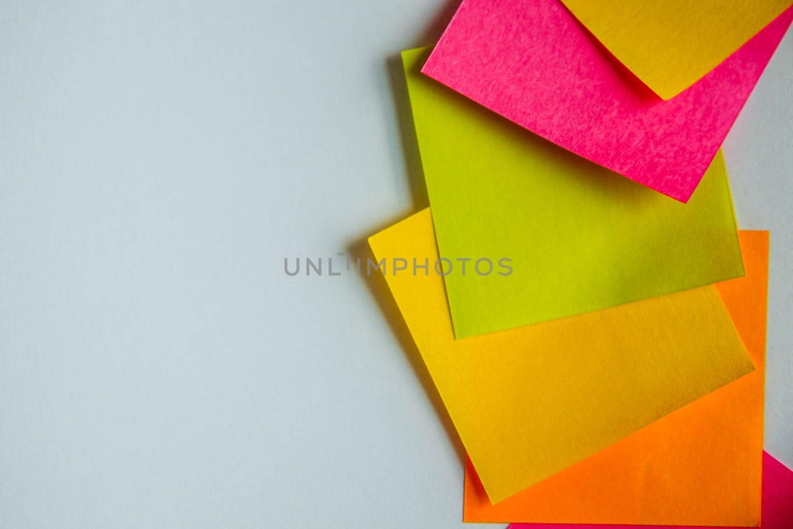 Colorful sticky notes on white