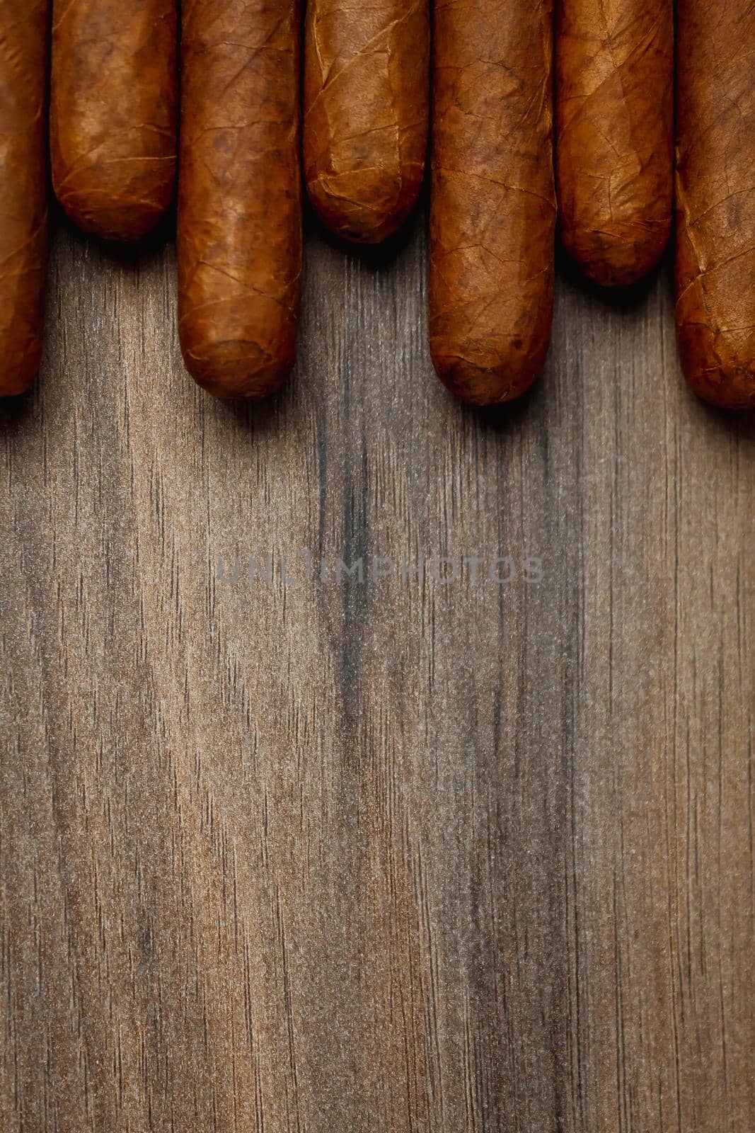 Cigars on the wooden background
