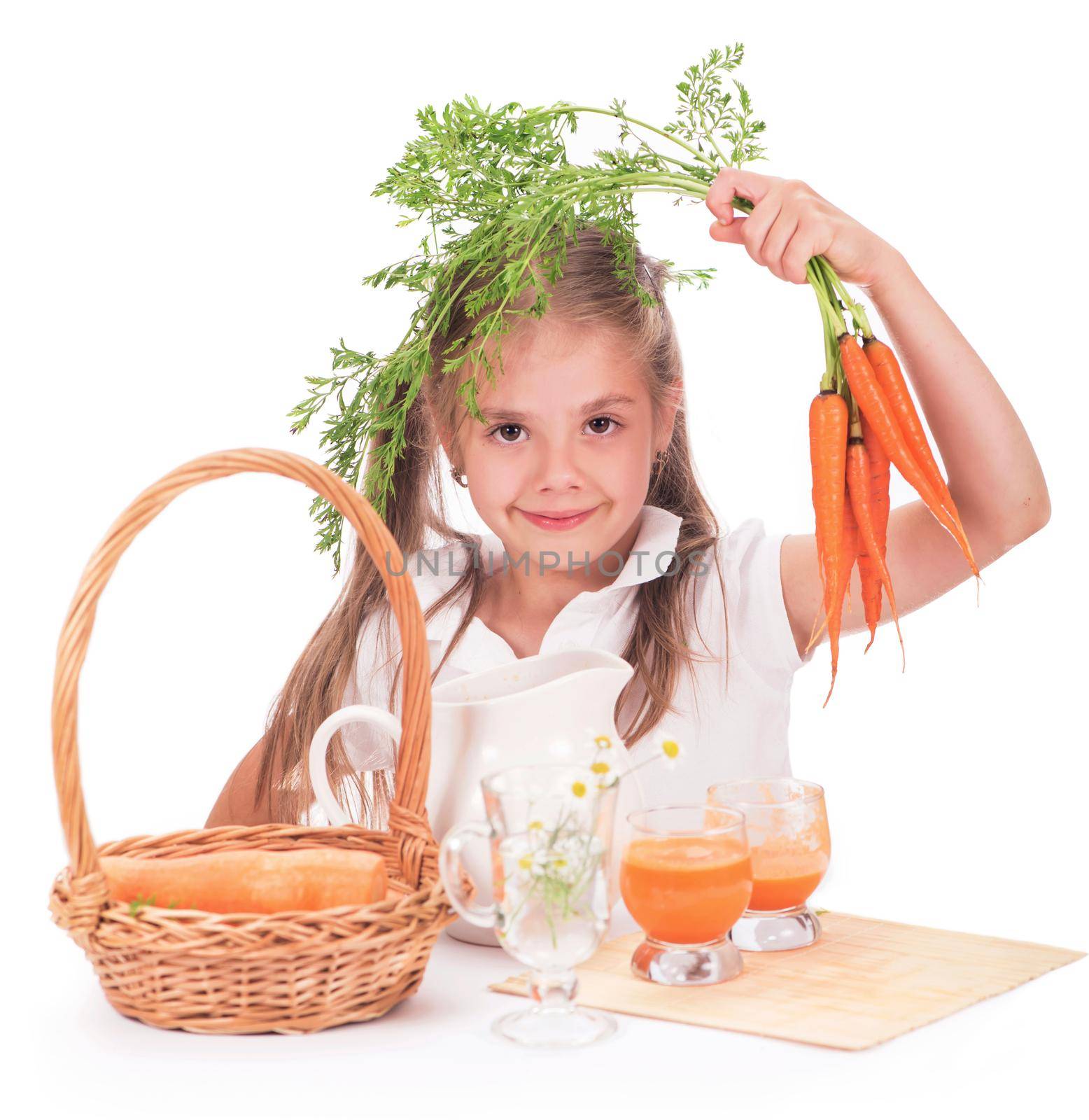 Girl and carrot juice isolated on white background by aprilphoto