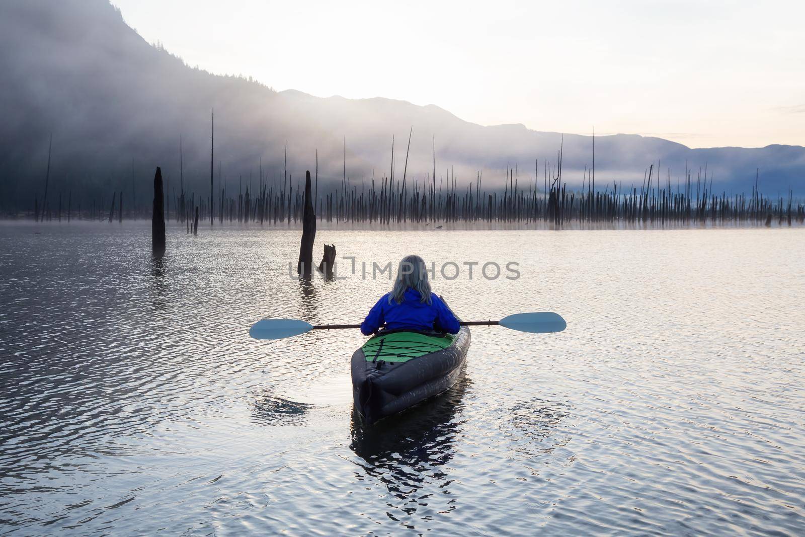 Girl Kayaking in a Lake by edb3_16