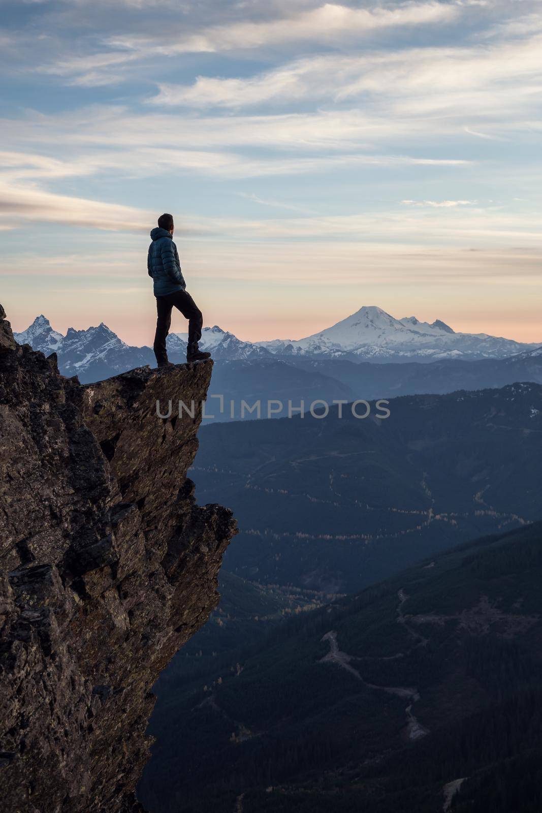 Adventurous man on top of the mountain by edb3_16