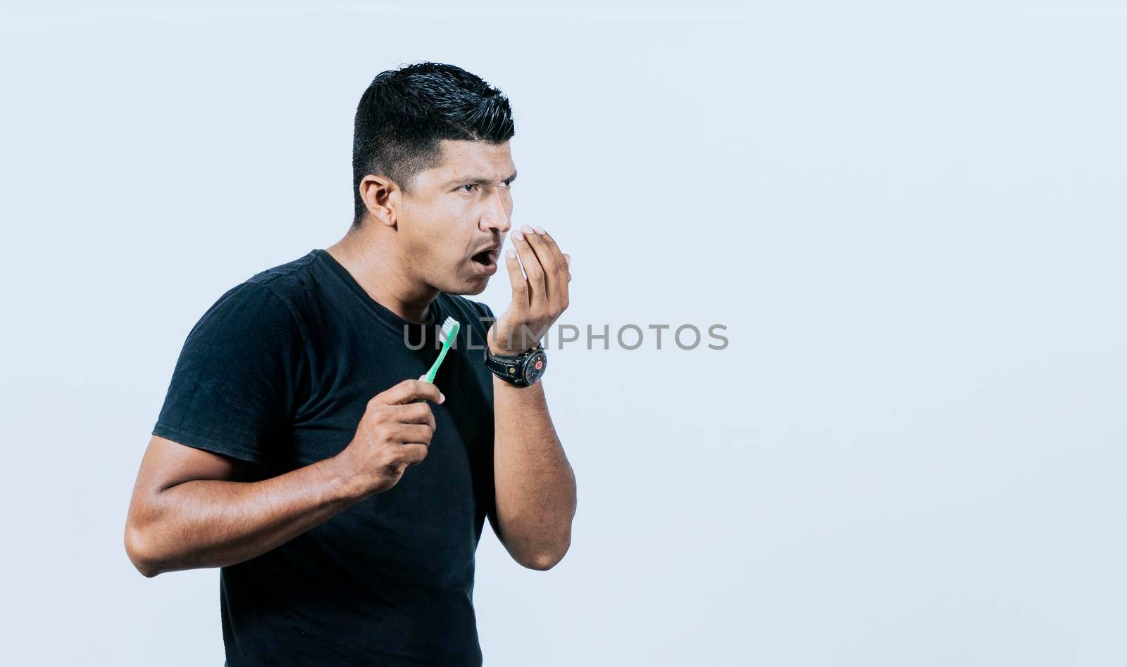 Person with brush with bad breath problem, Man with brush and bad breath, Concept of person with halitosis
