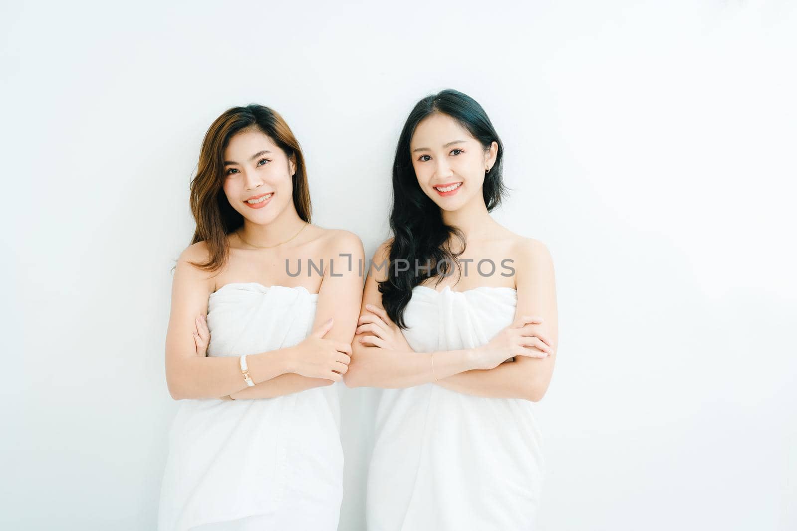 lgbtq, LGBT concept, homosexuality, portrait of two Asian women posing happy together and showing love for each other while taking a shower by Manastrong