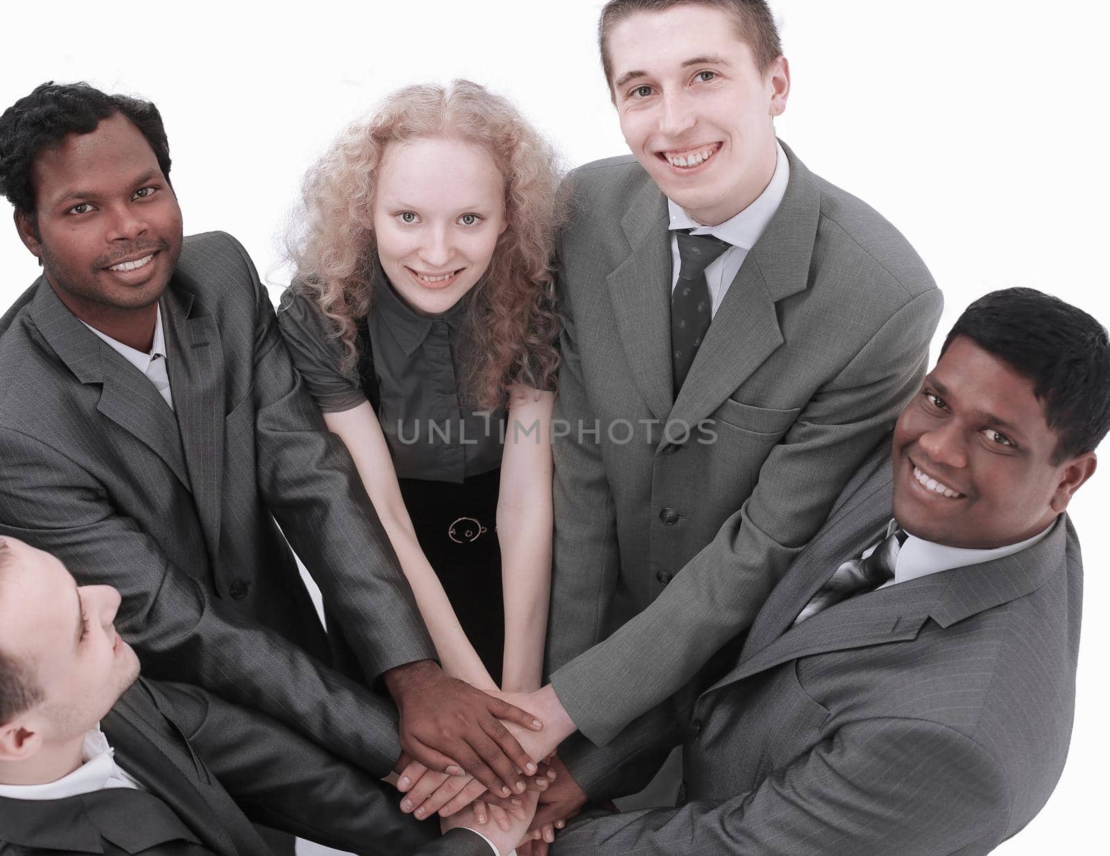international business team showing their unity. the concept of teamwork.photo with copy space