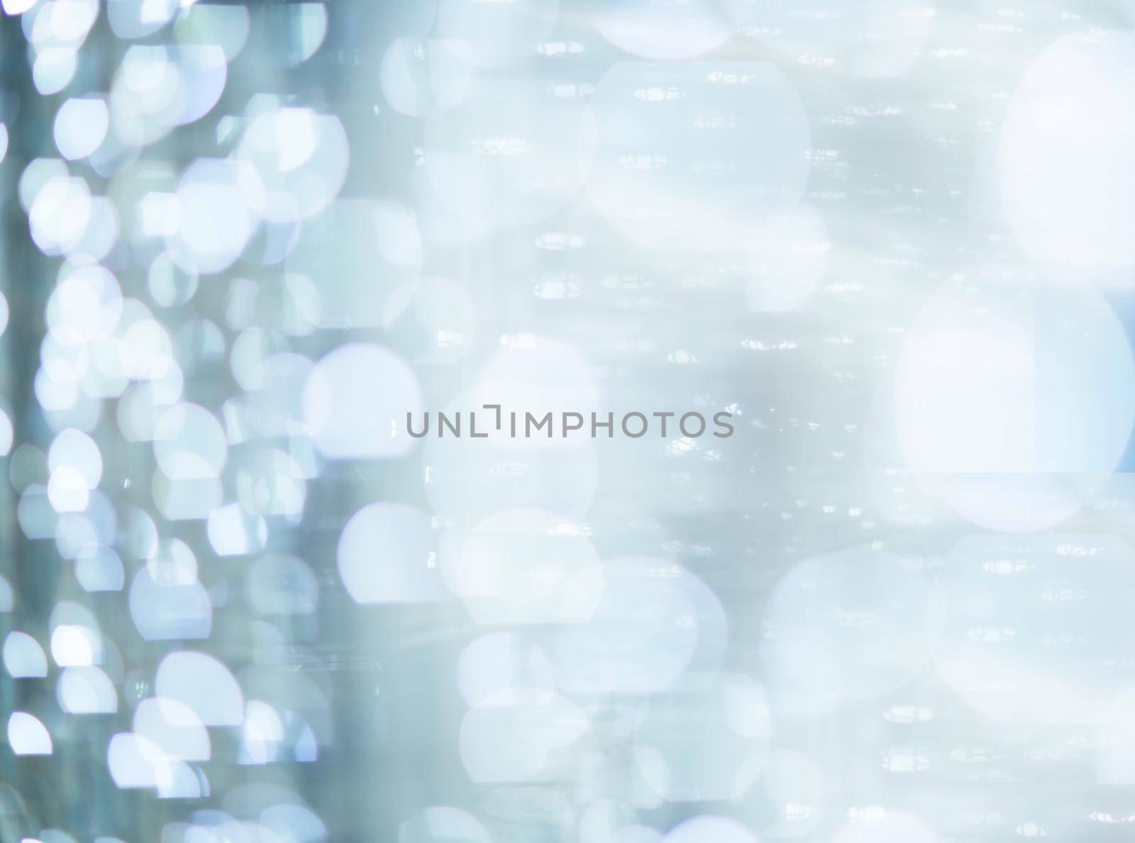 silver and white bokeh lights defocused.