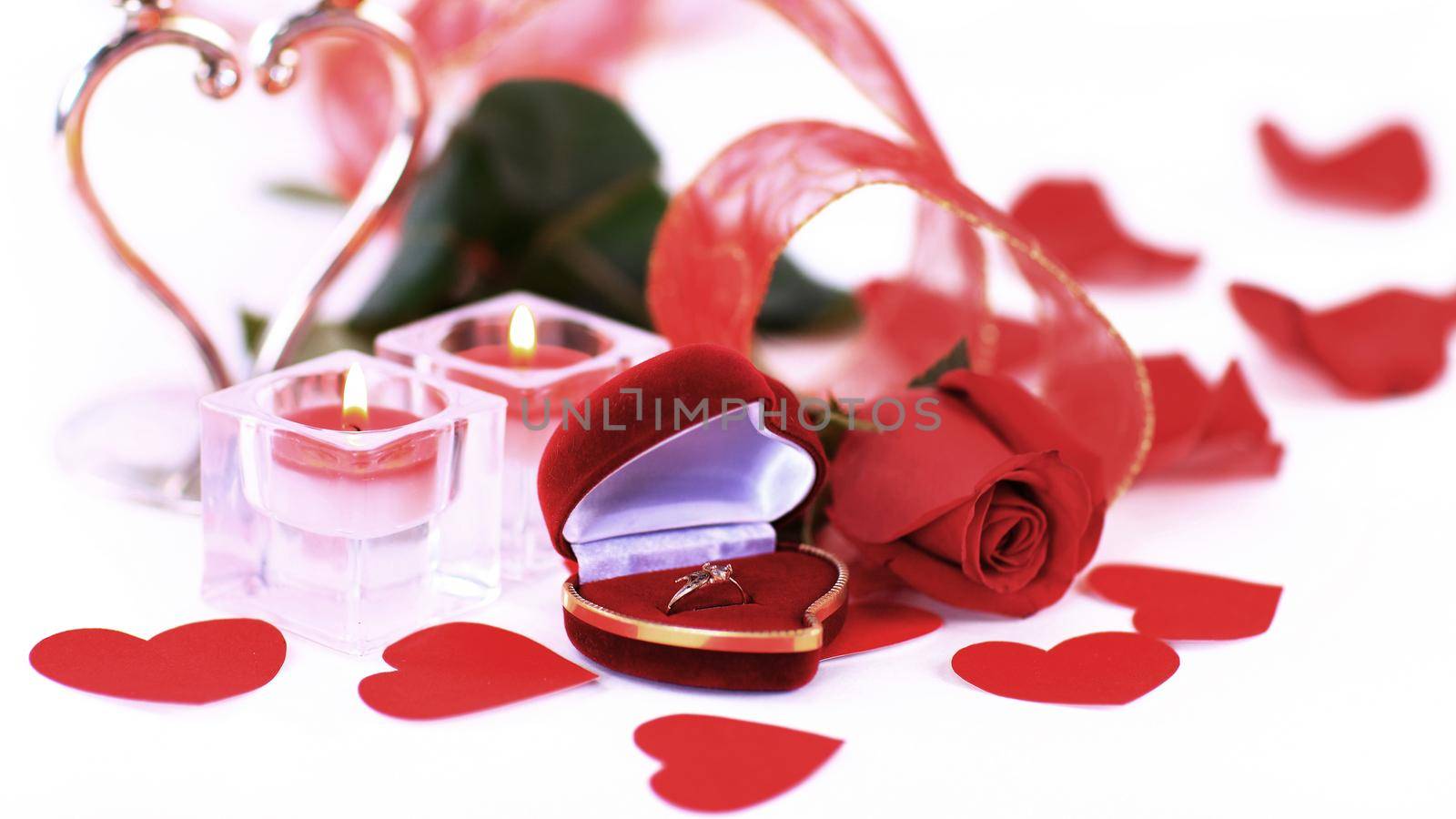rose and a box with rings. Valentine's day