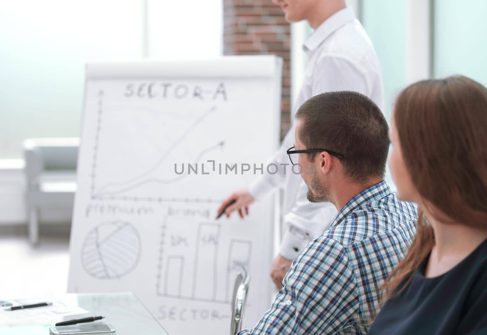 business colleagues sitting at the Desk and discussing new ideas.photo with copy space.