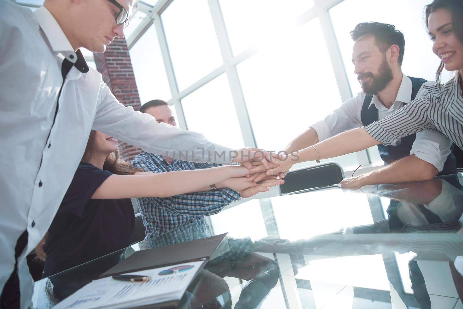 business partners shake hands during a working meeting.the concept of cooperation