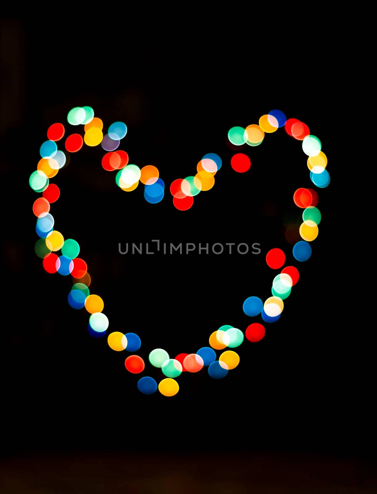 Bokeh with the shape of a heart with multi colors by EdVal