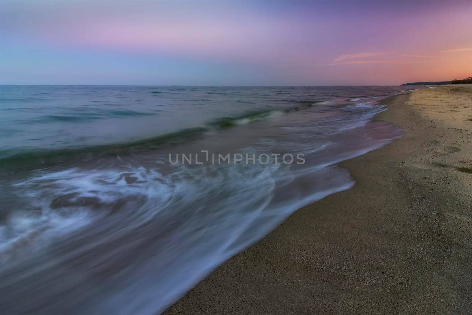 on the beach after sunset .Beautiful  low exposure water nature. 