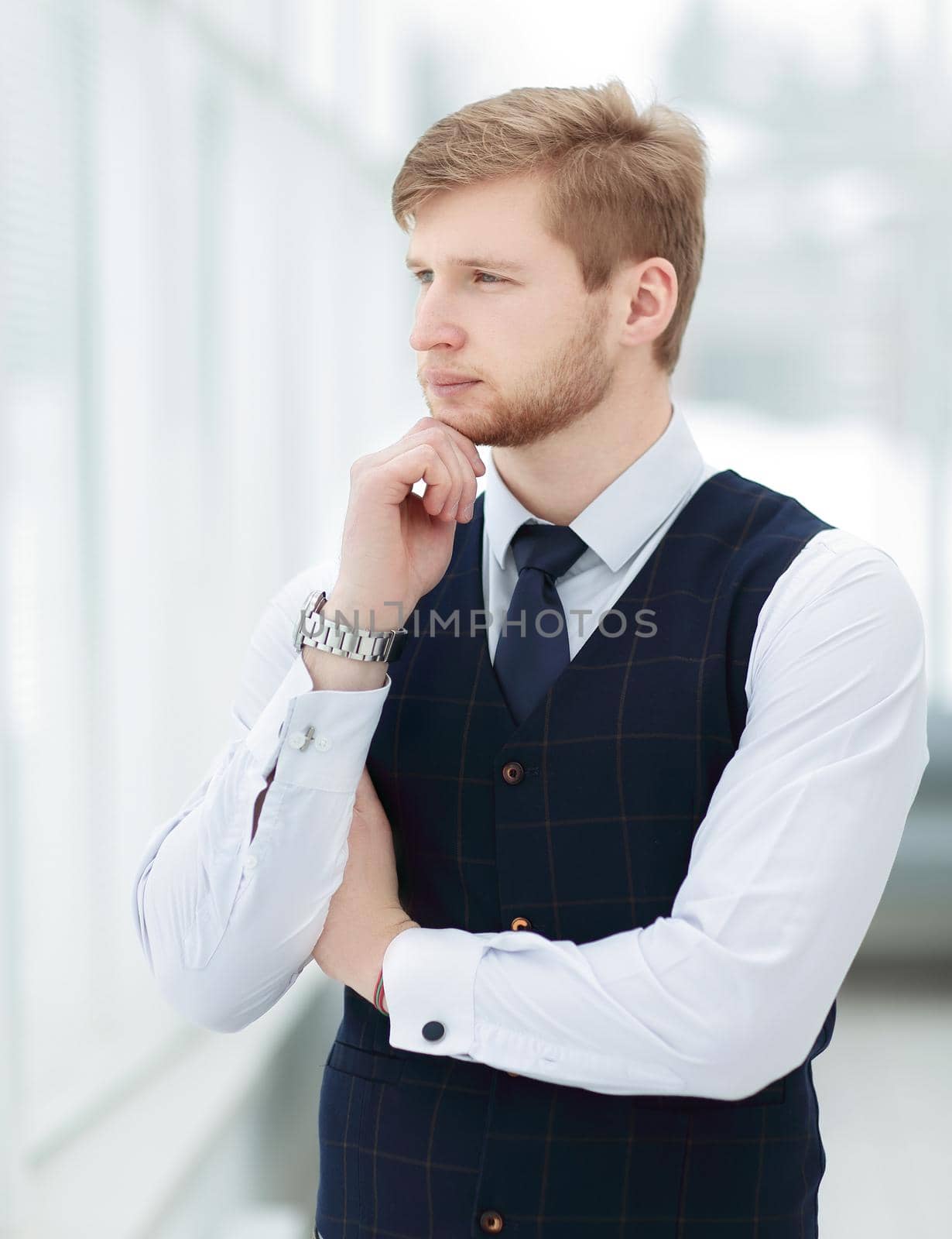 Portrait of a businessman looking at the window.photo with copy space