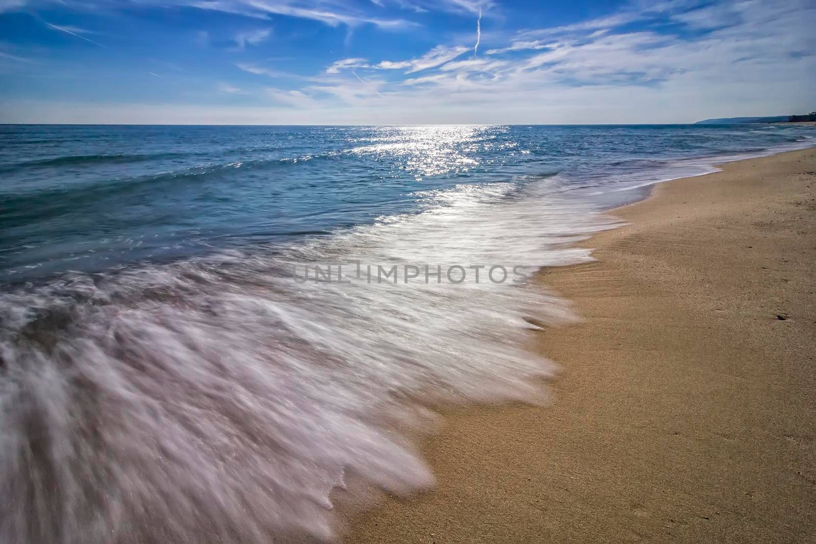 Summertime, blue sea and waves. Beautiful  low exposure water nature