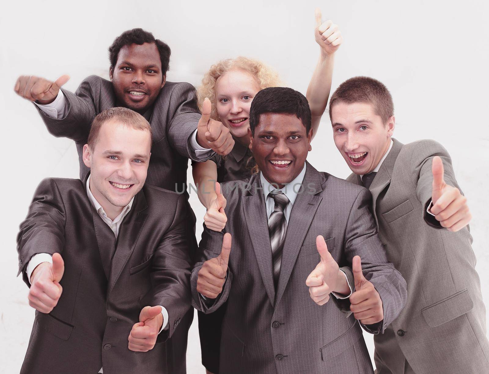 international business team showing thumbs up. the concept of teamwork.photo with copy space