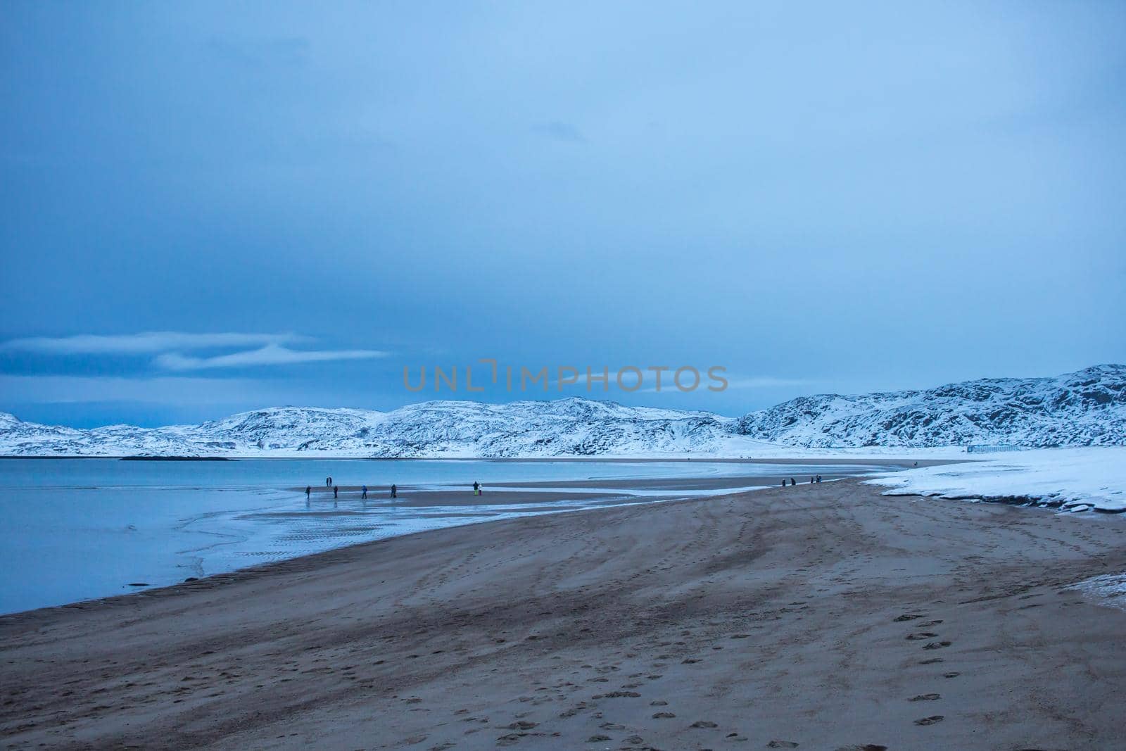 North beach on the Barents sea coast in the Arctic circle in the far North in the Murmansk region Teriberka village in the cold winter.