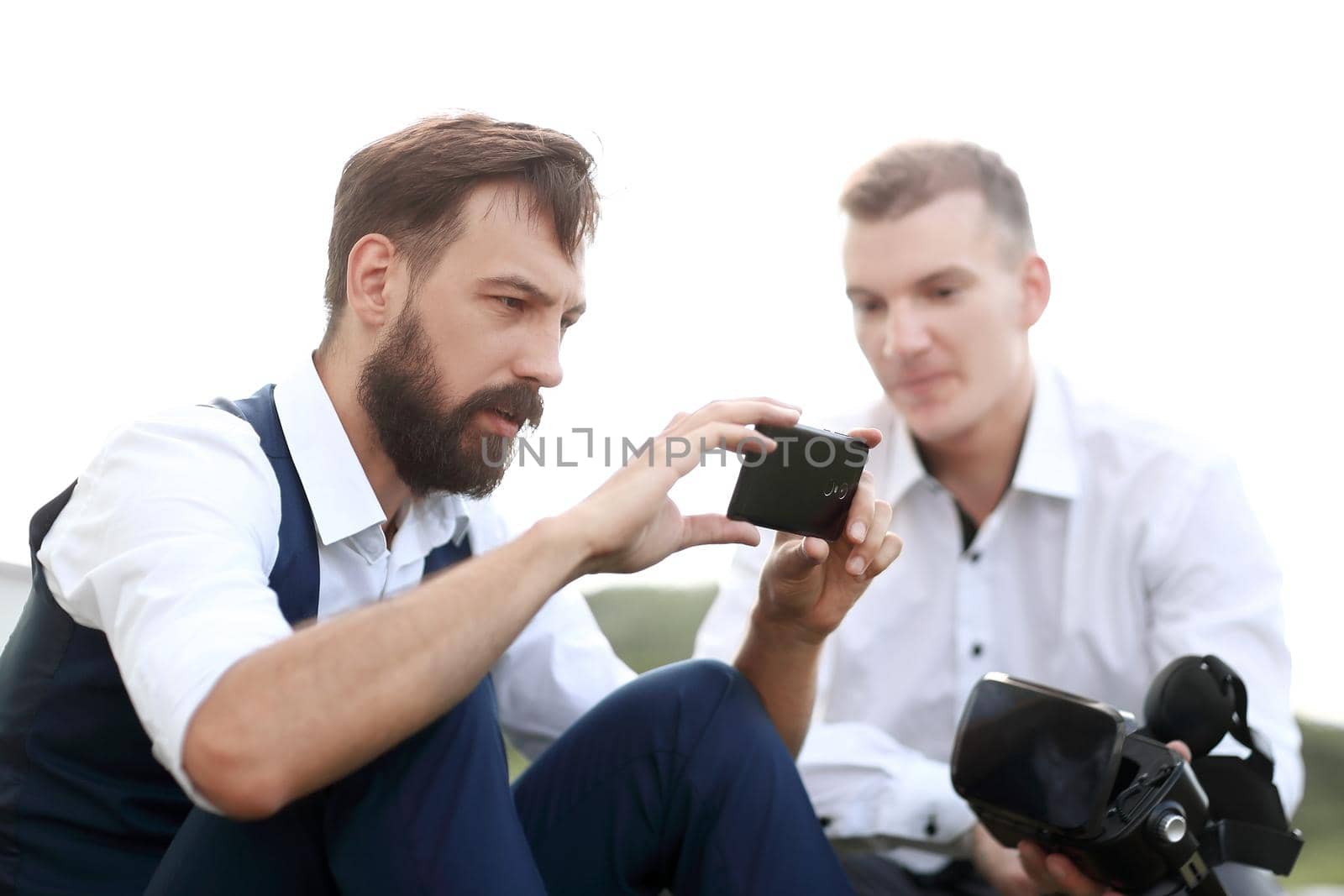 close up. modern man taking selfies outdoors . people and technology