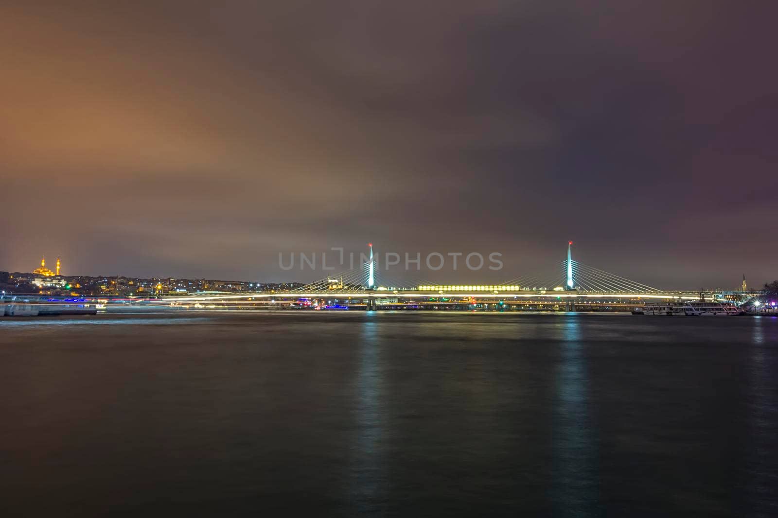 Scenic view at new Halic Metro Bridge view at night. Halic Metro Bridge is in Golden Horn, Istanbul.