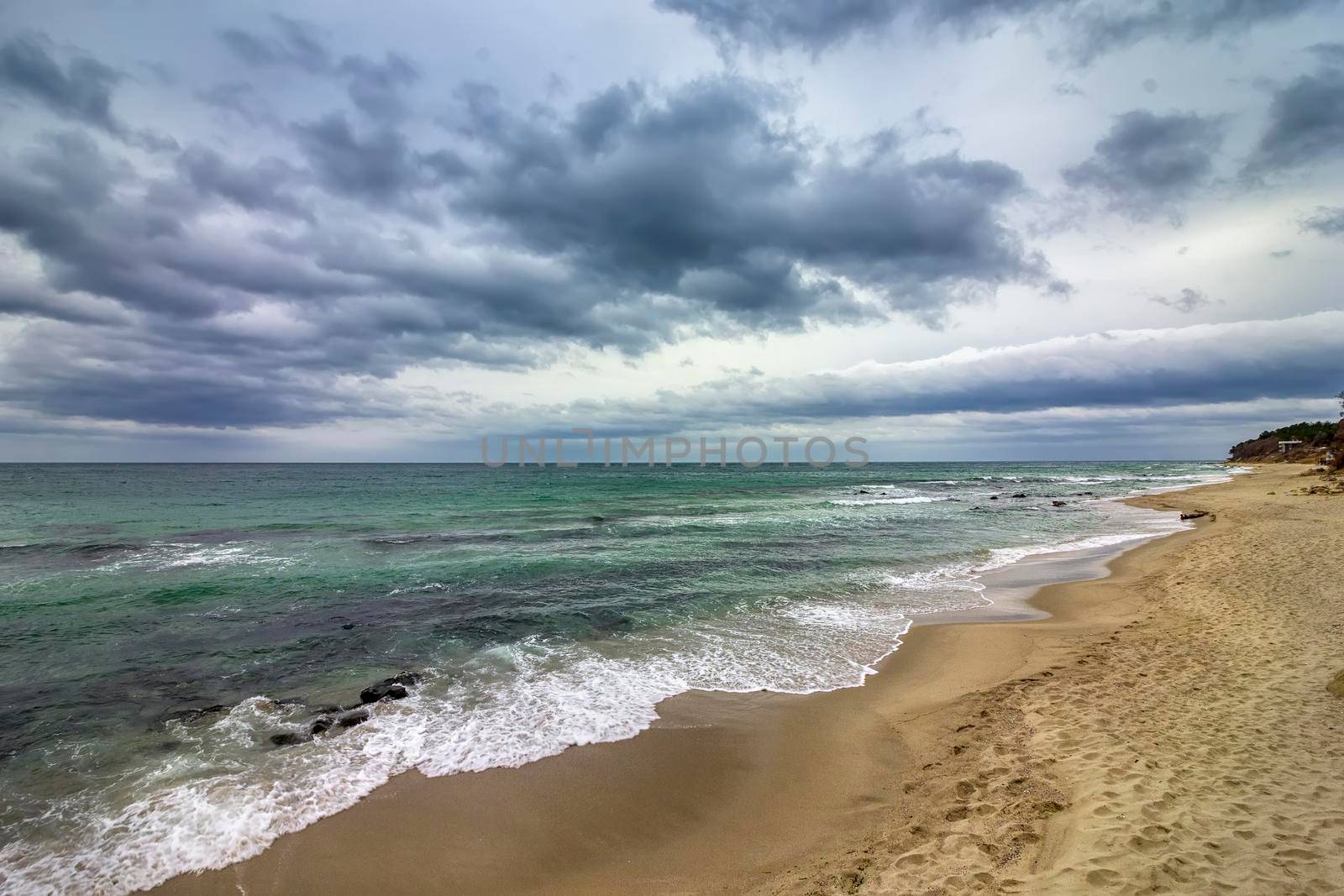 beautiful coastal view over a calm cloudy day