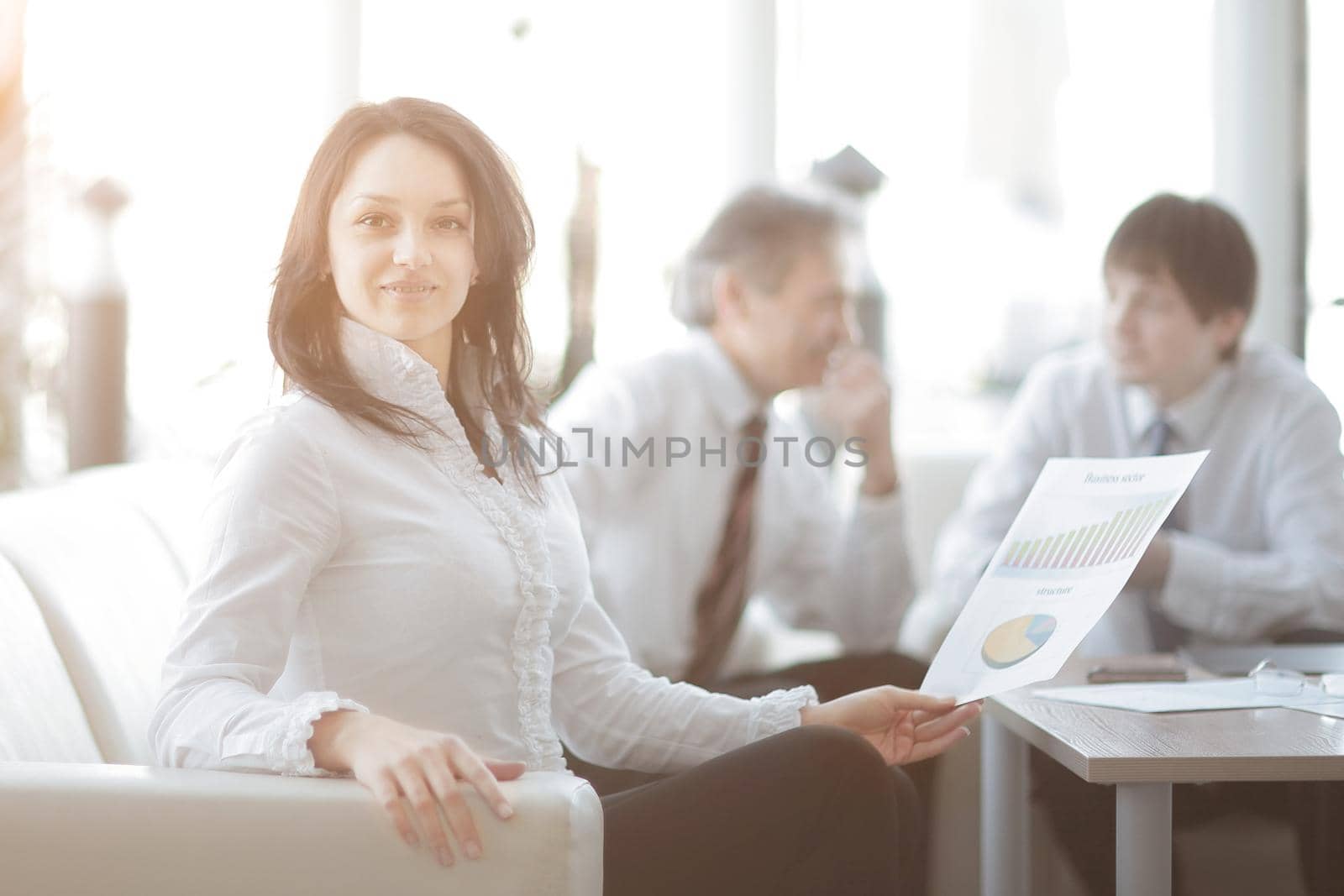 portrait of business woman on the background of colleagues.photo with copy space