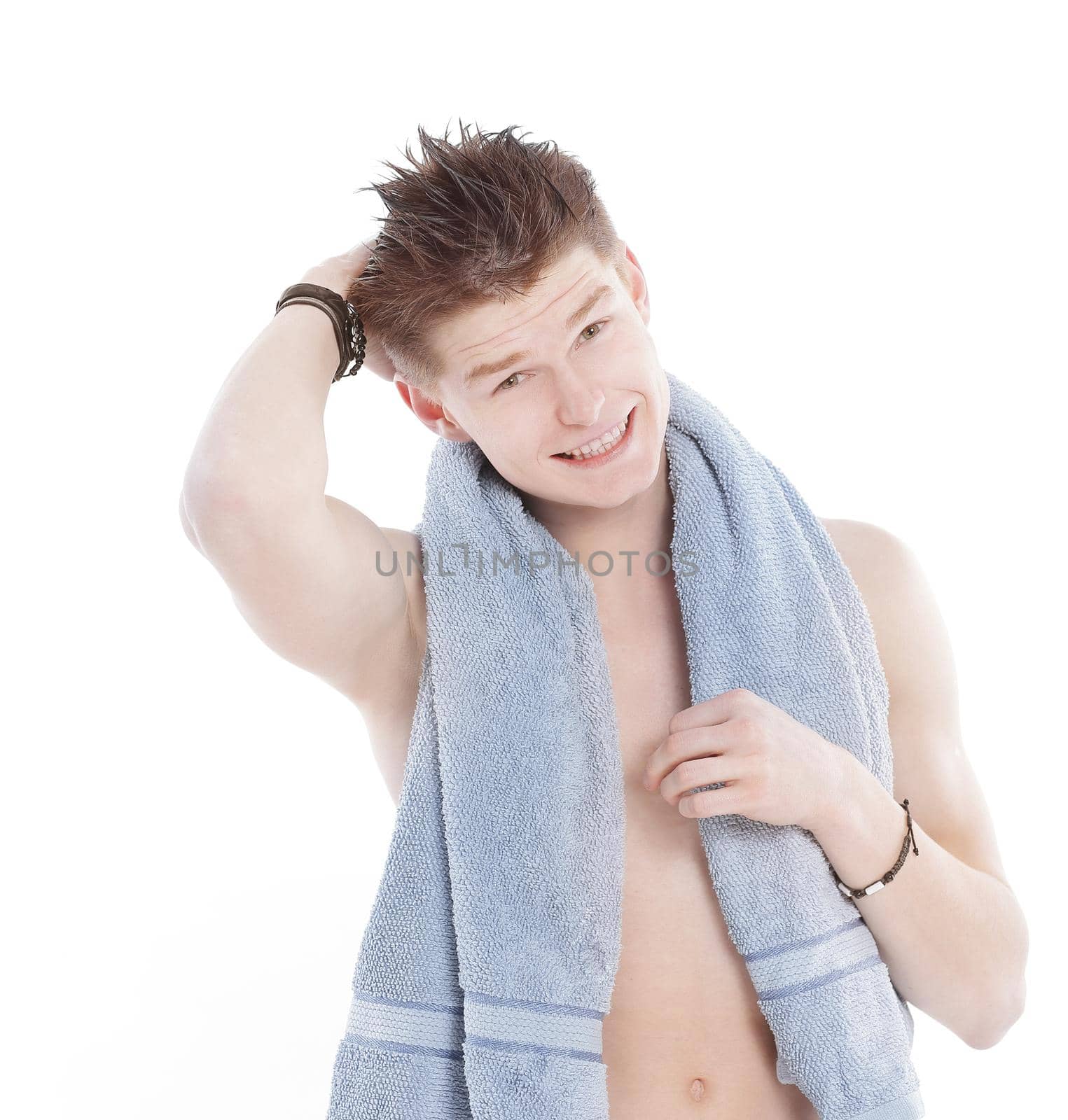 young man with towel relaxing after shower.isolated on white background