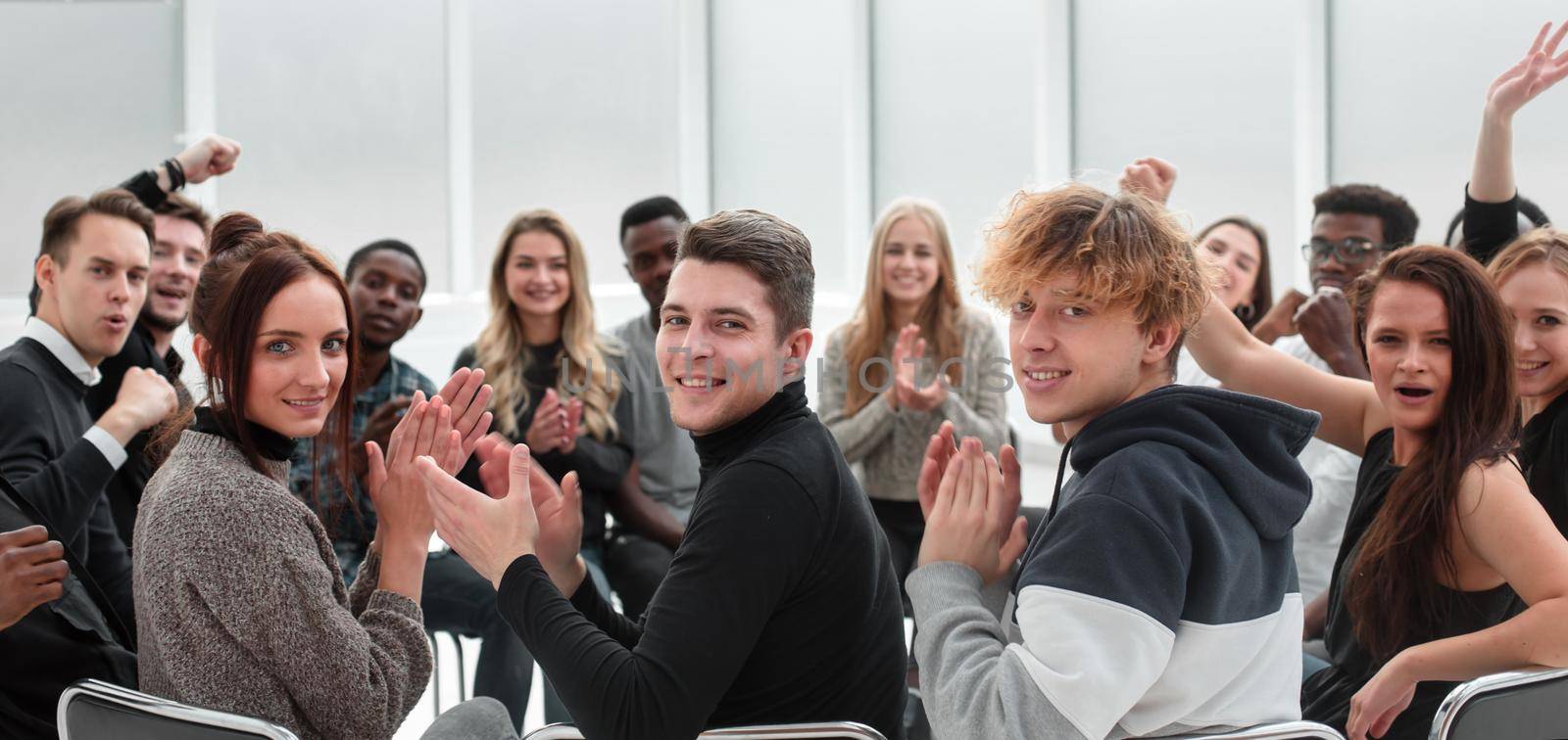 participants of the business seminar supporting each other with applause . photo with a copy-space