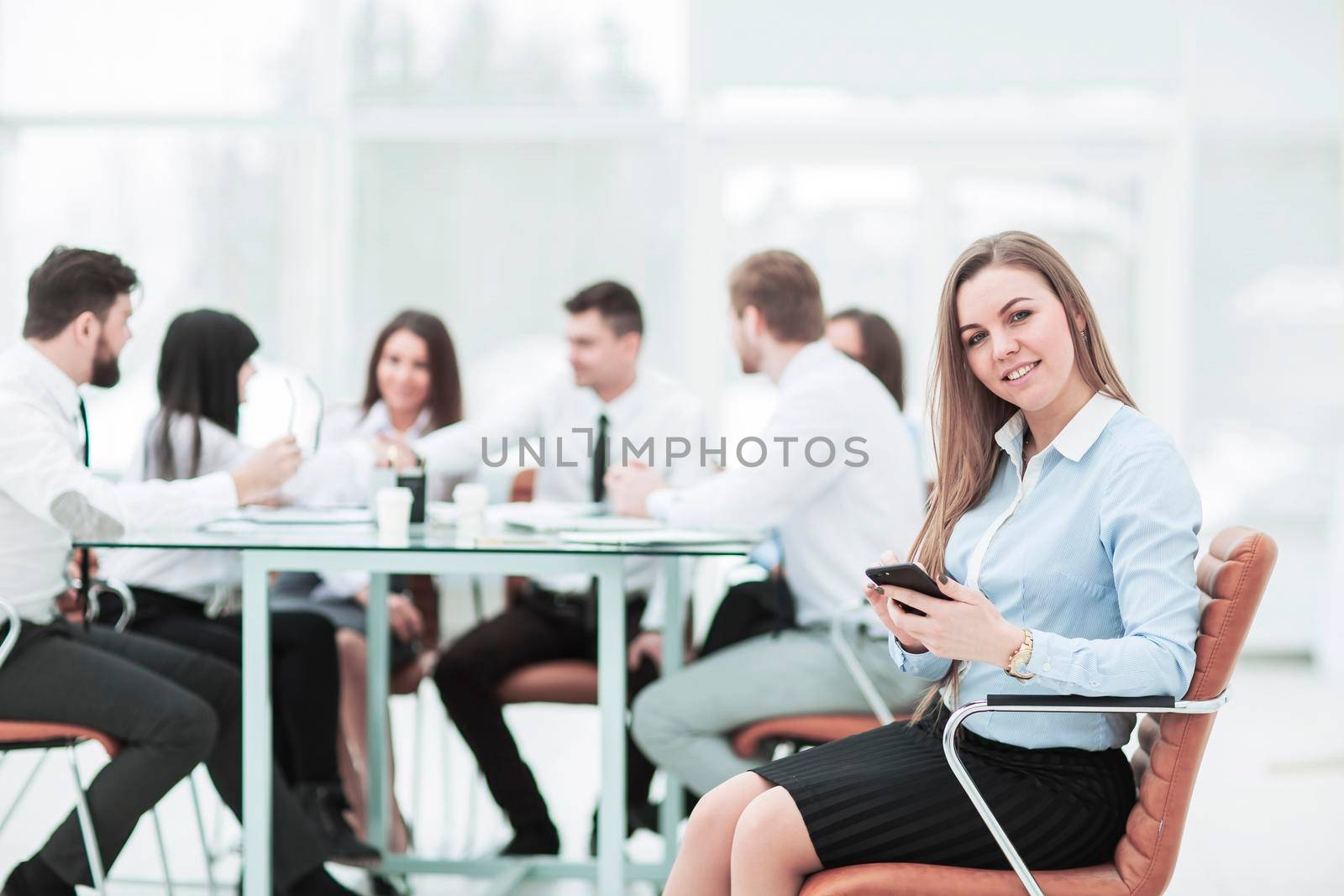 leading lawyer of the company on background, business meeting business partners. the photo has a empty space for your text.