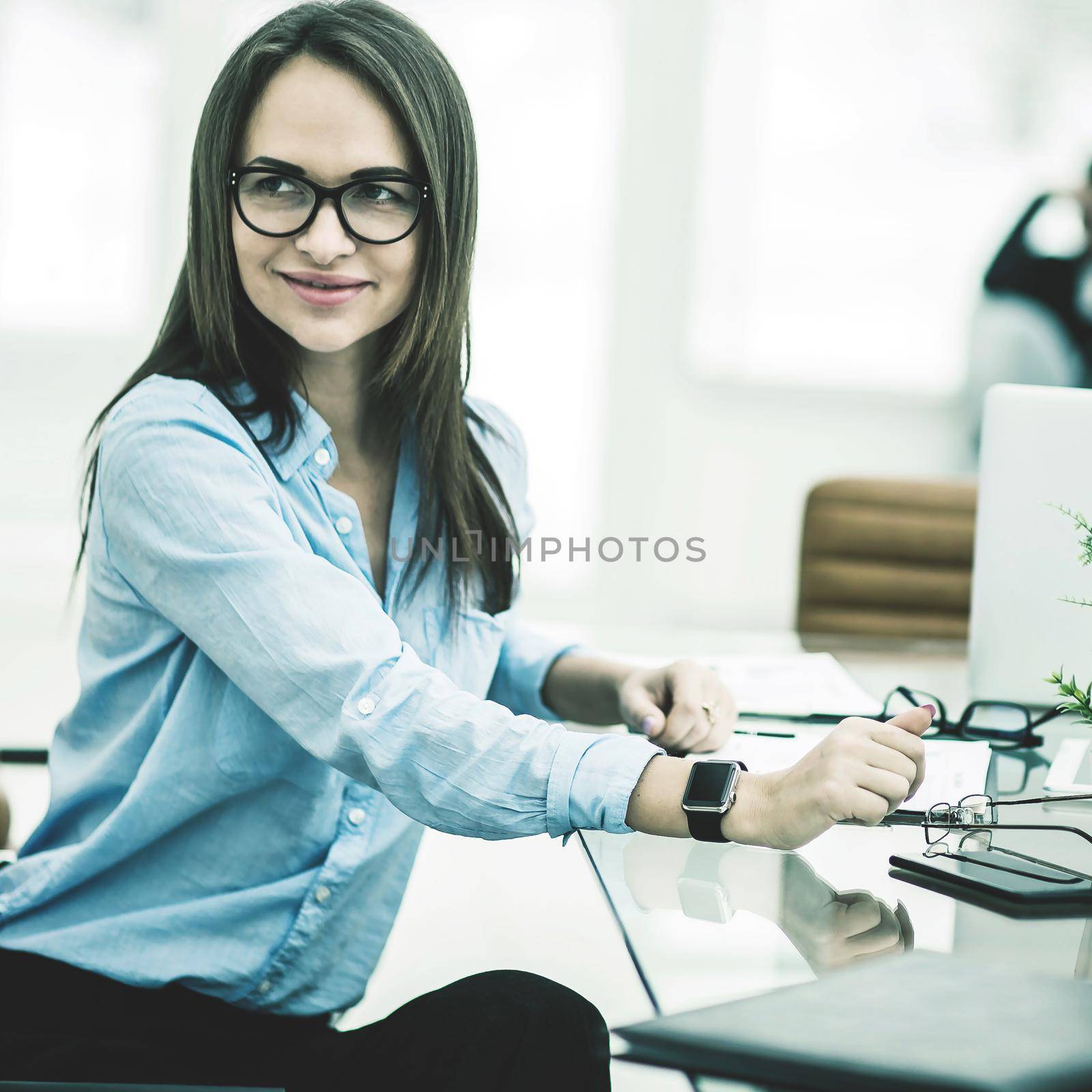 portrait of Manager Finance in the workplace in a modern office by SmartPhotoLab